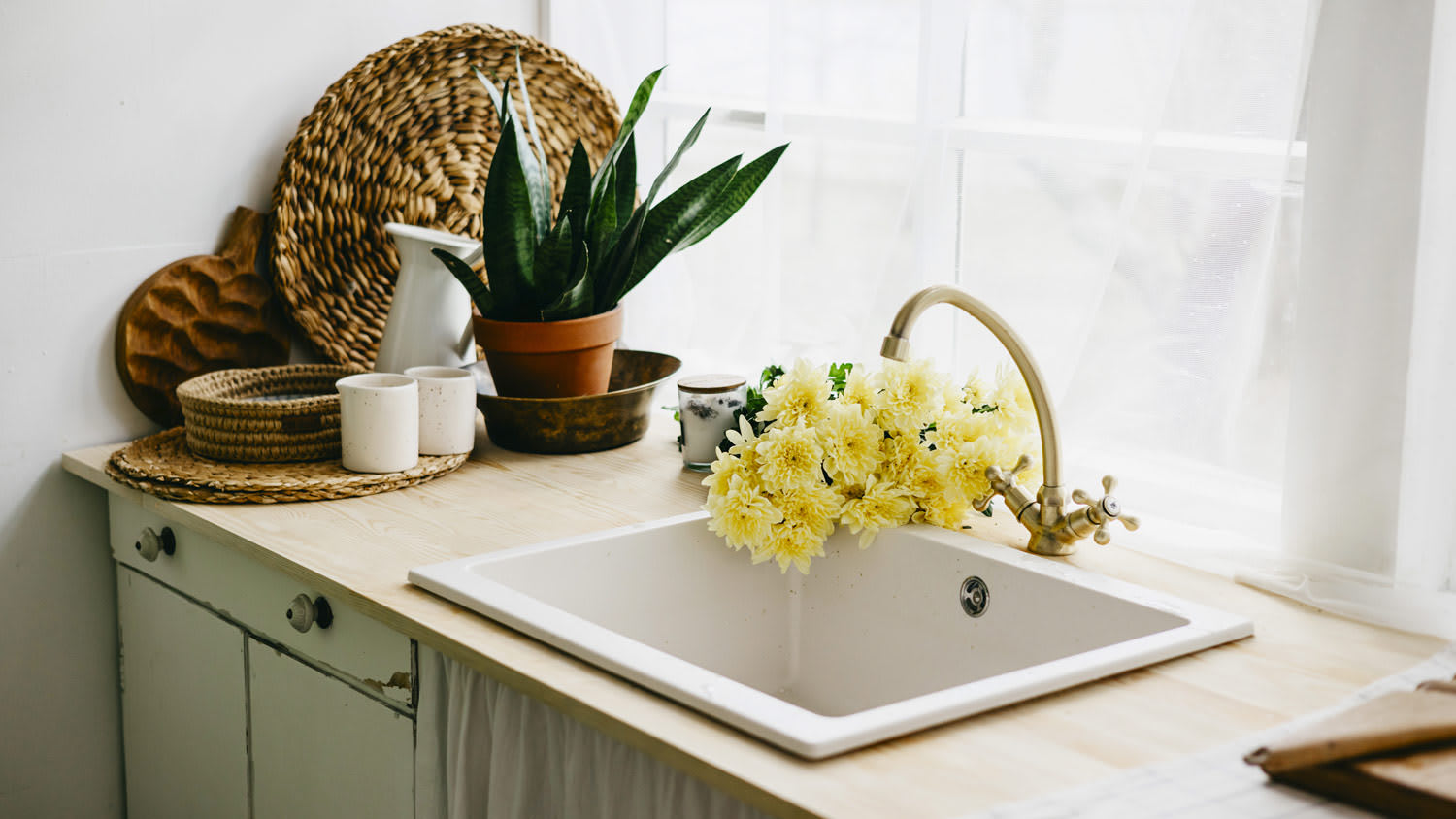 Top mount kitchen sink in butcherblock countertop