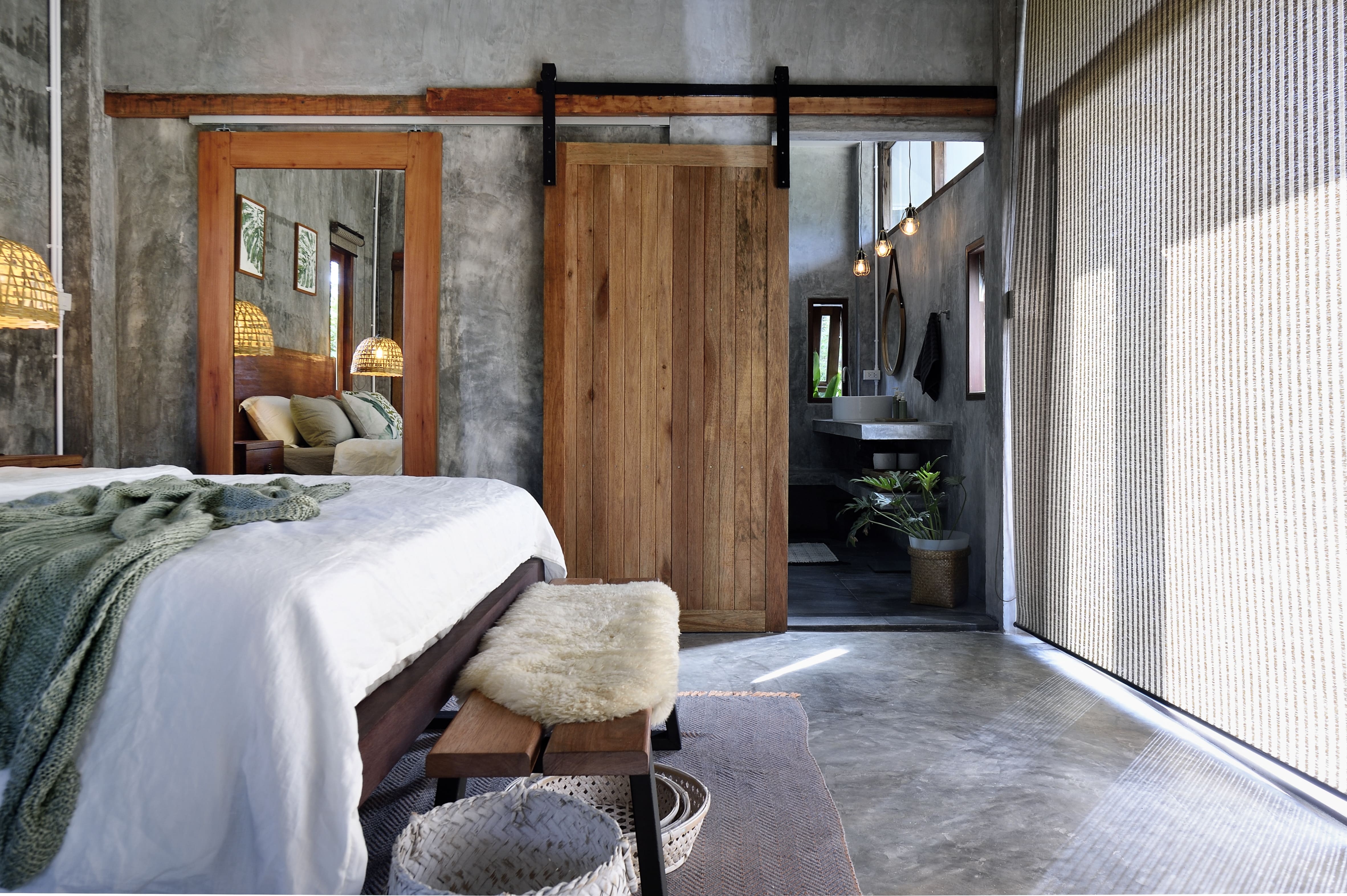 Modern sliding door in industrial bedroom