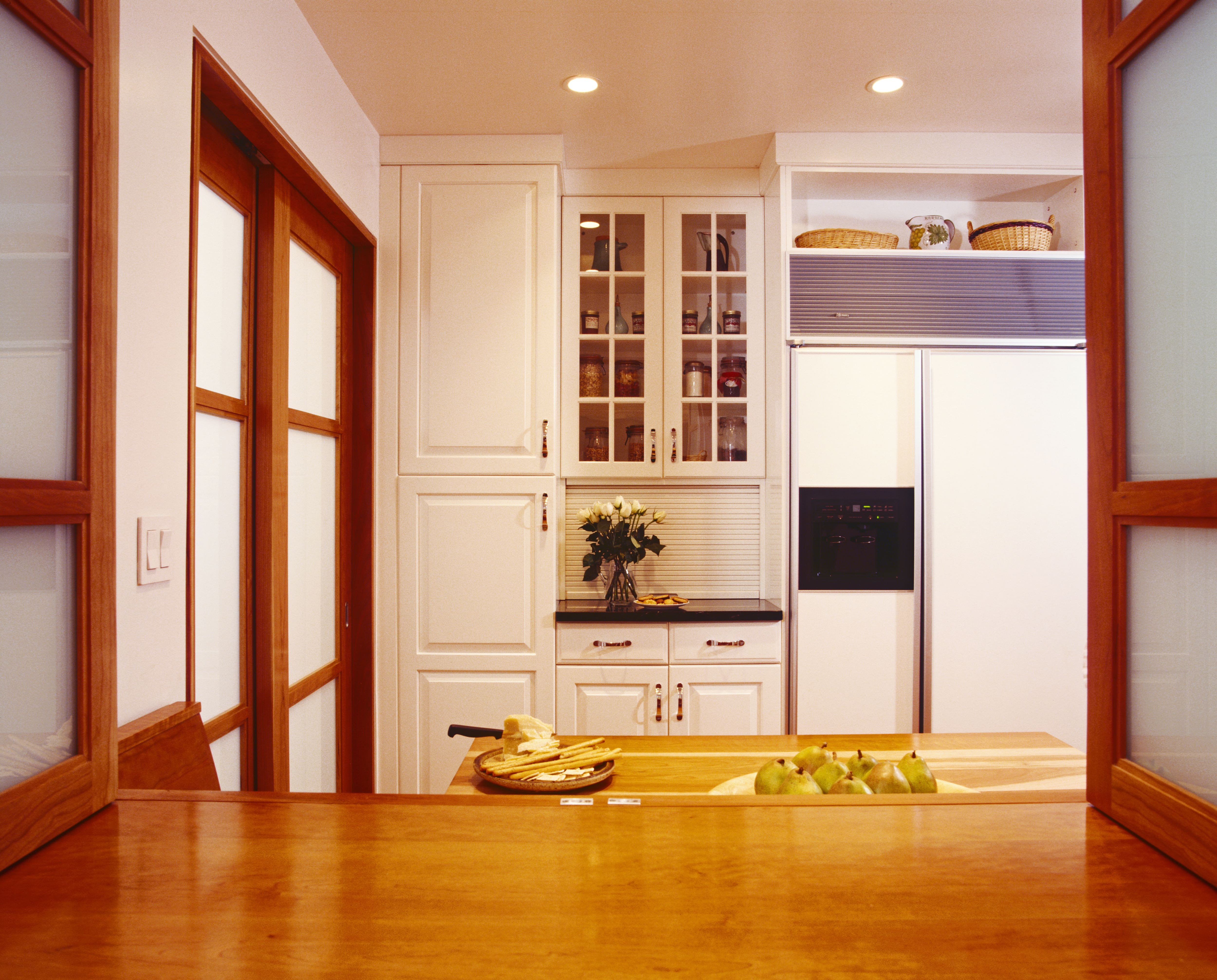 Frosted glass sliding doors in kitchen
