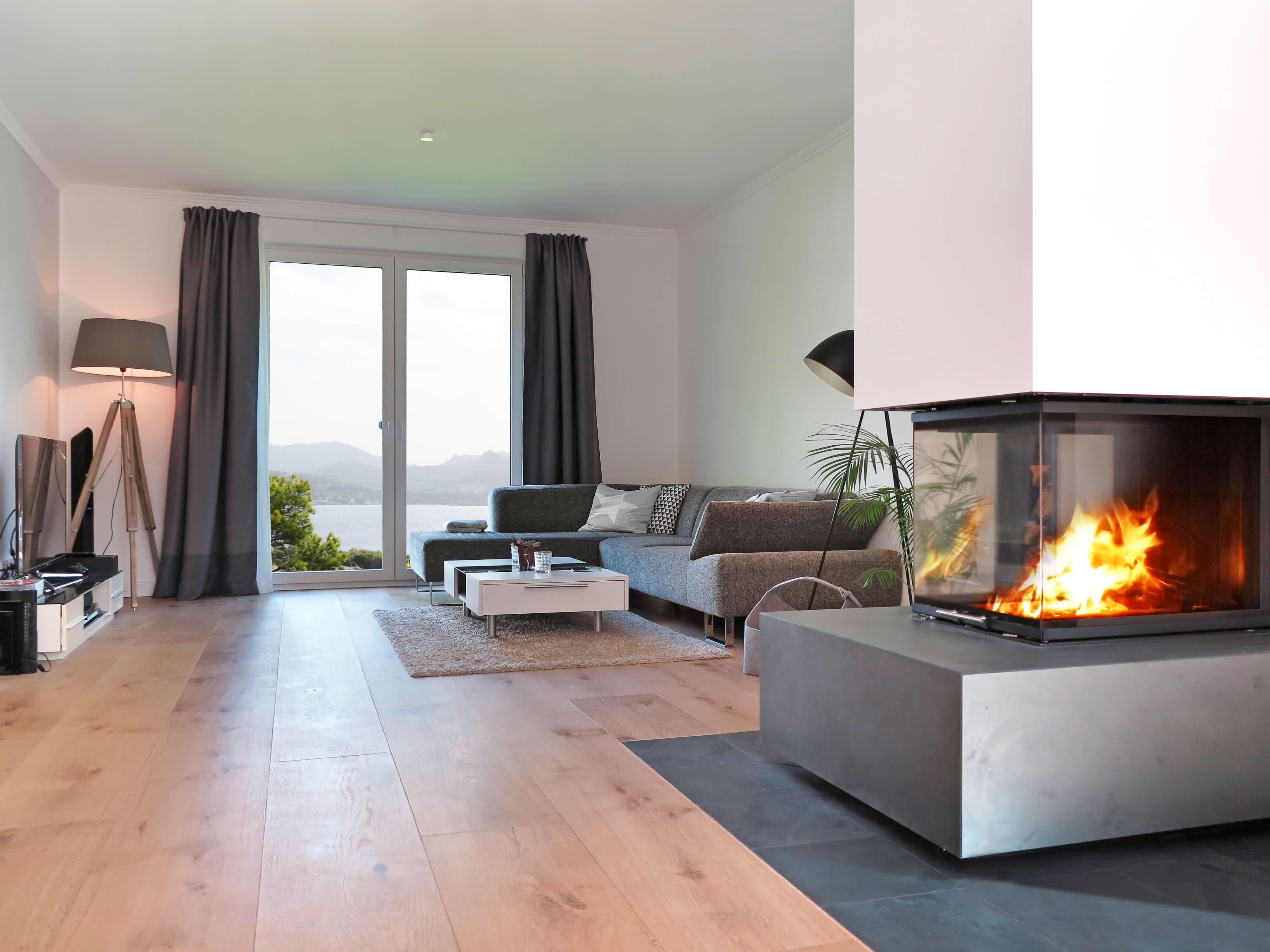 Modern fireplace in open-concept room