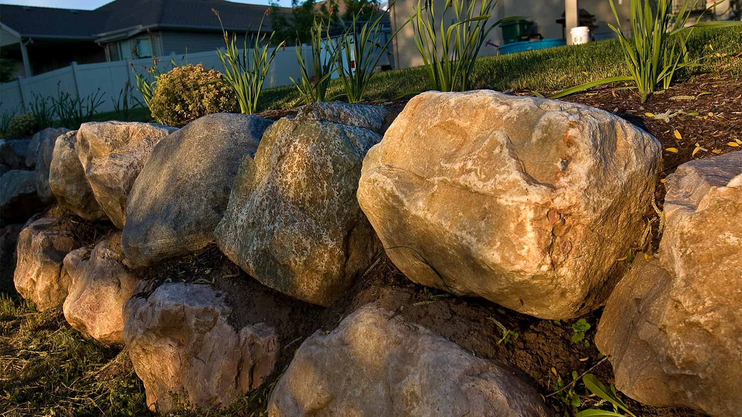 Stones on hillside in yard
