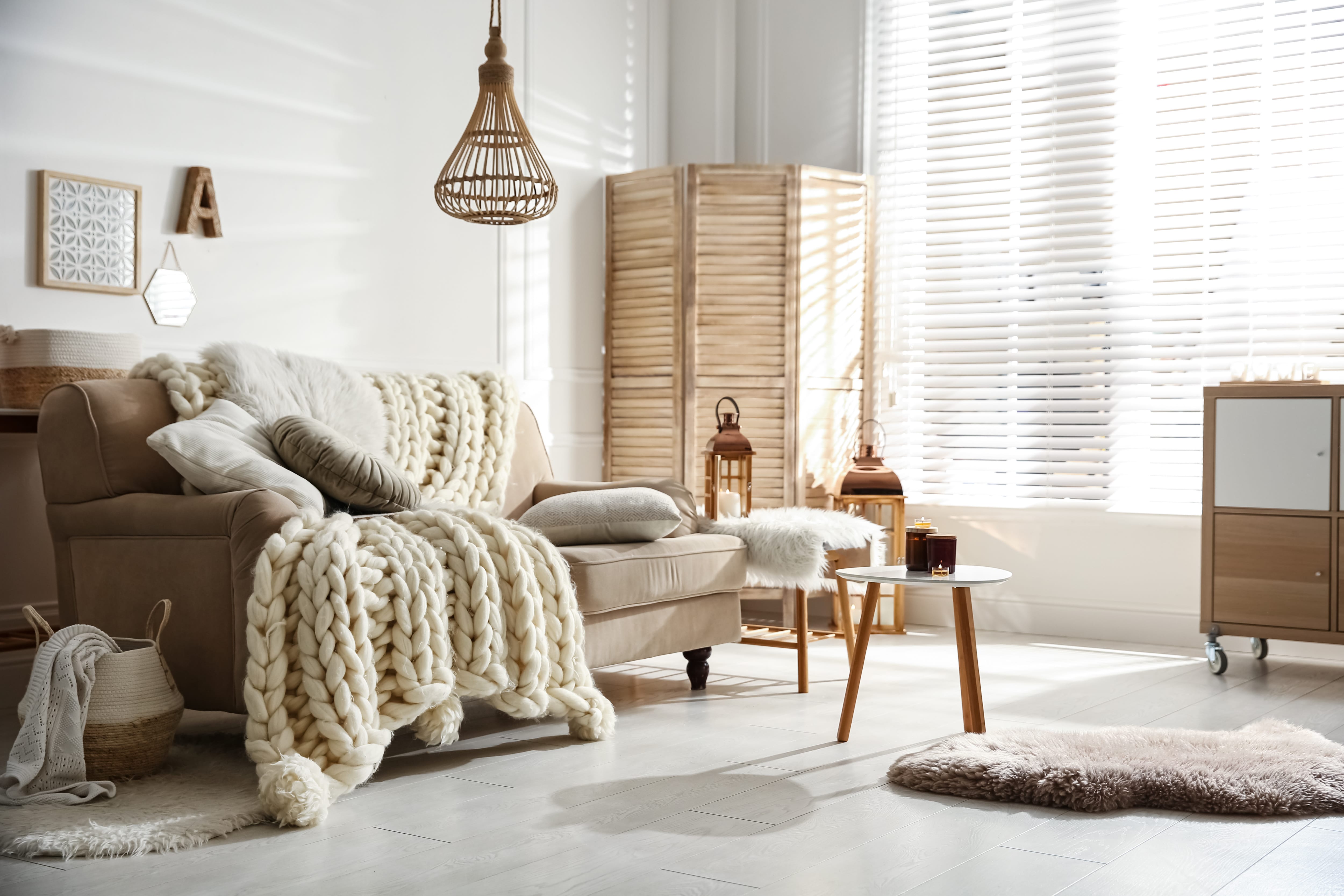Bohemian living room with wood privacy screen
