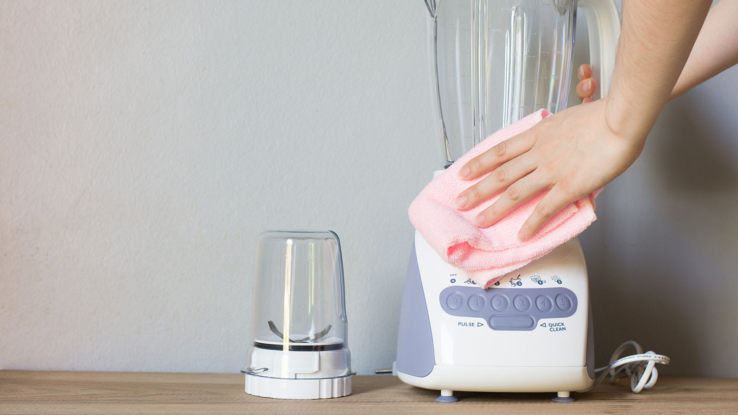 Cleaning kitchen blender with a cloth
