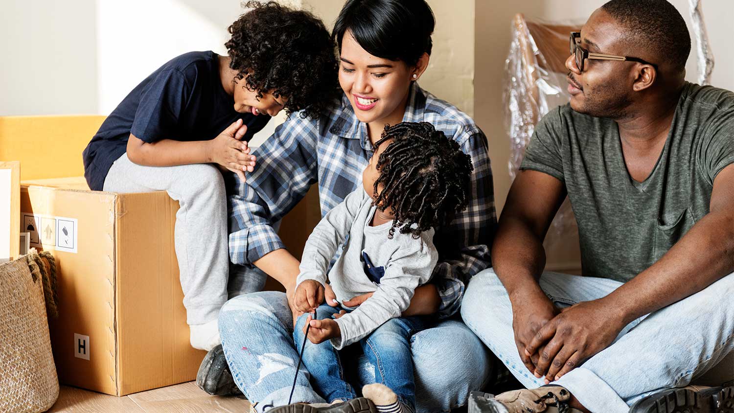 Family with moving boxes
