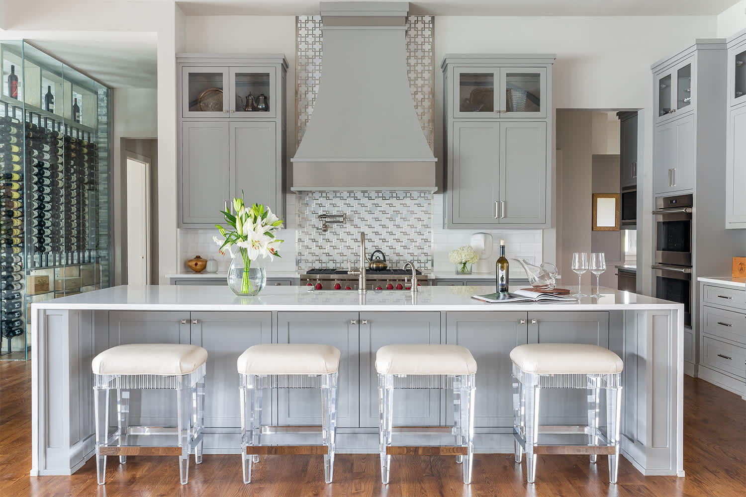 white kitchen with pewter range hood