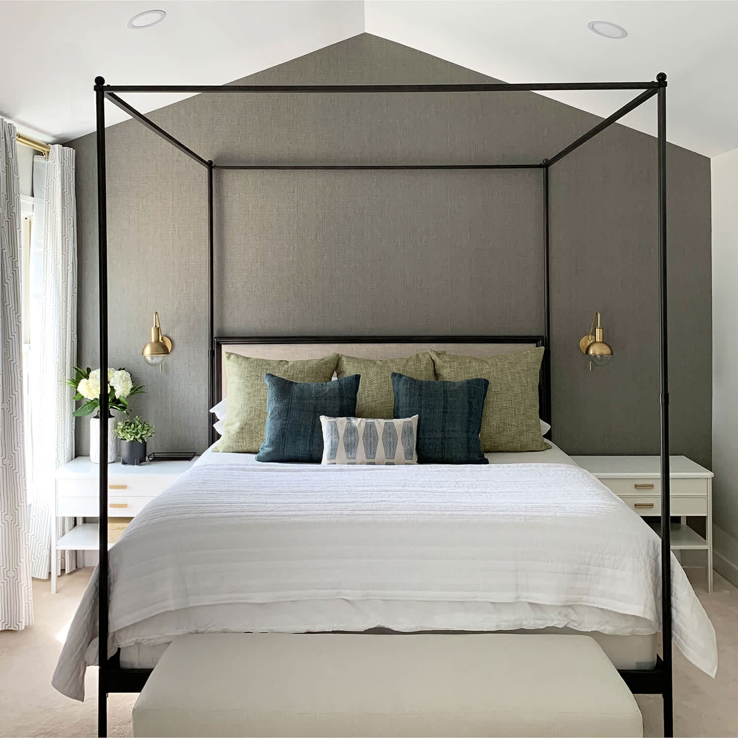 bedroom with accent pewter wall