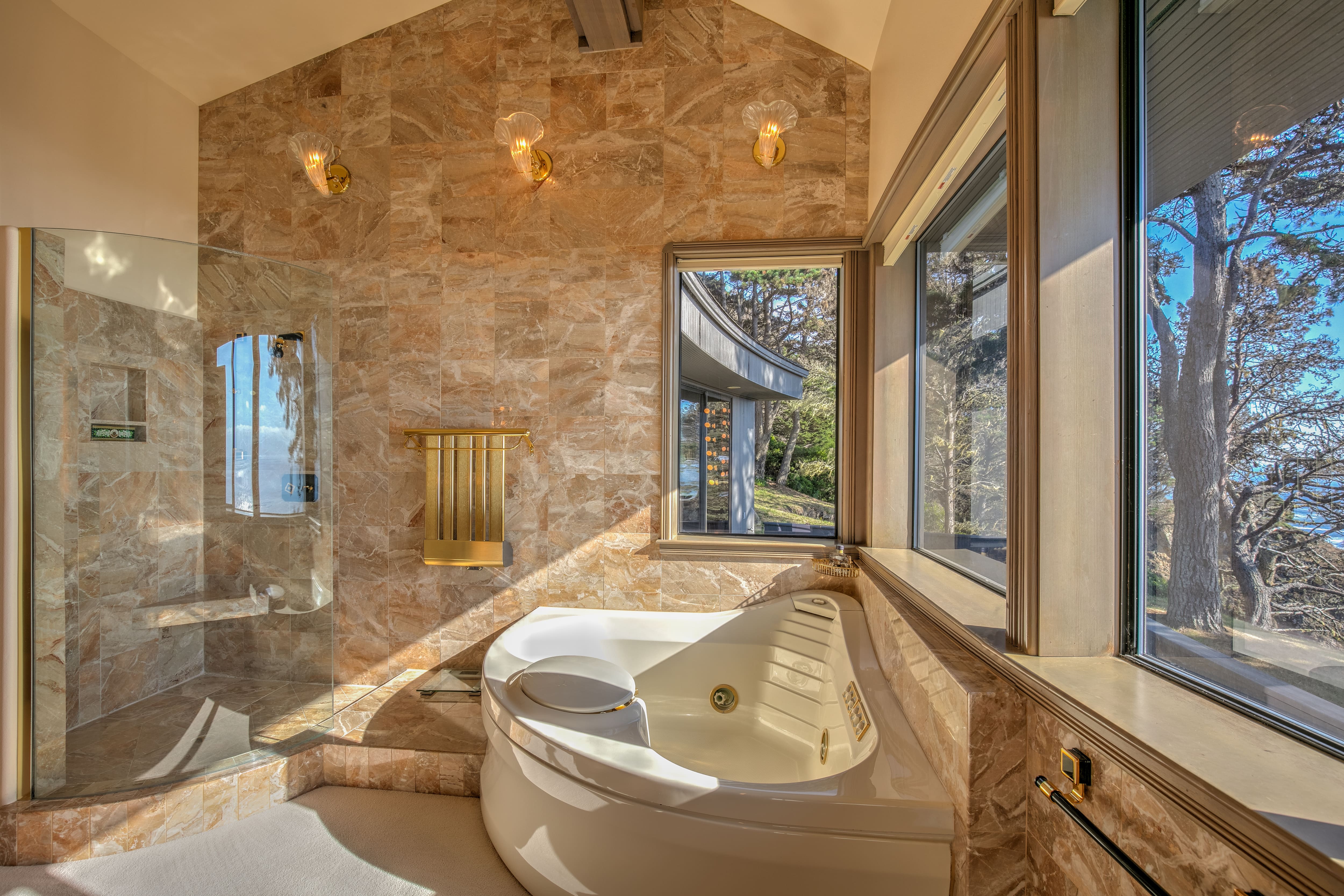 Stone tile accent wall in bathroom
