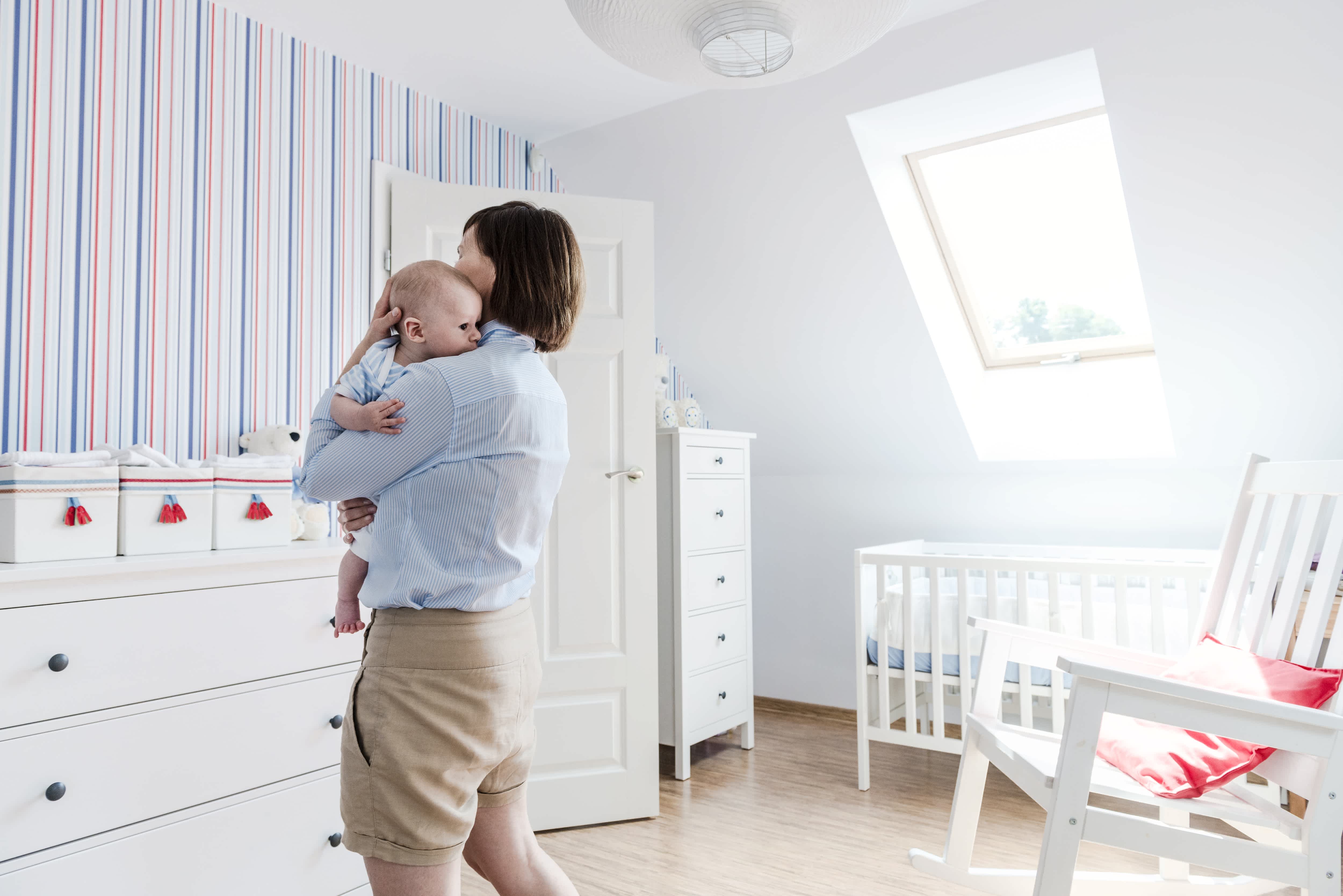 Striped accent wall in nursery