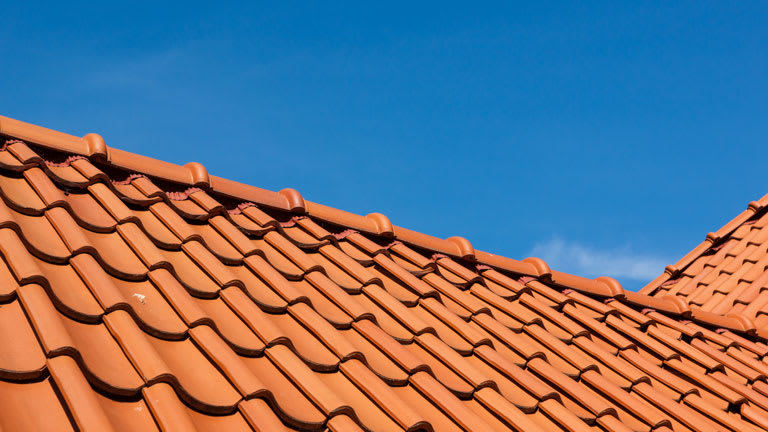 roof tile pattern, close up, over blue sky