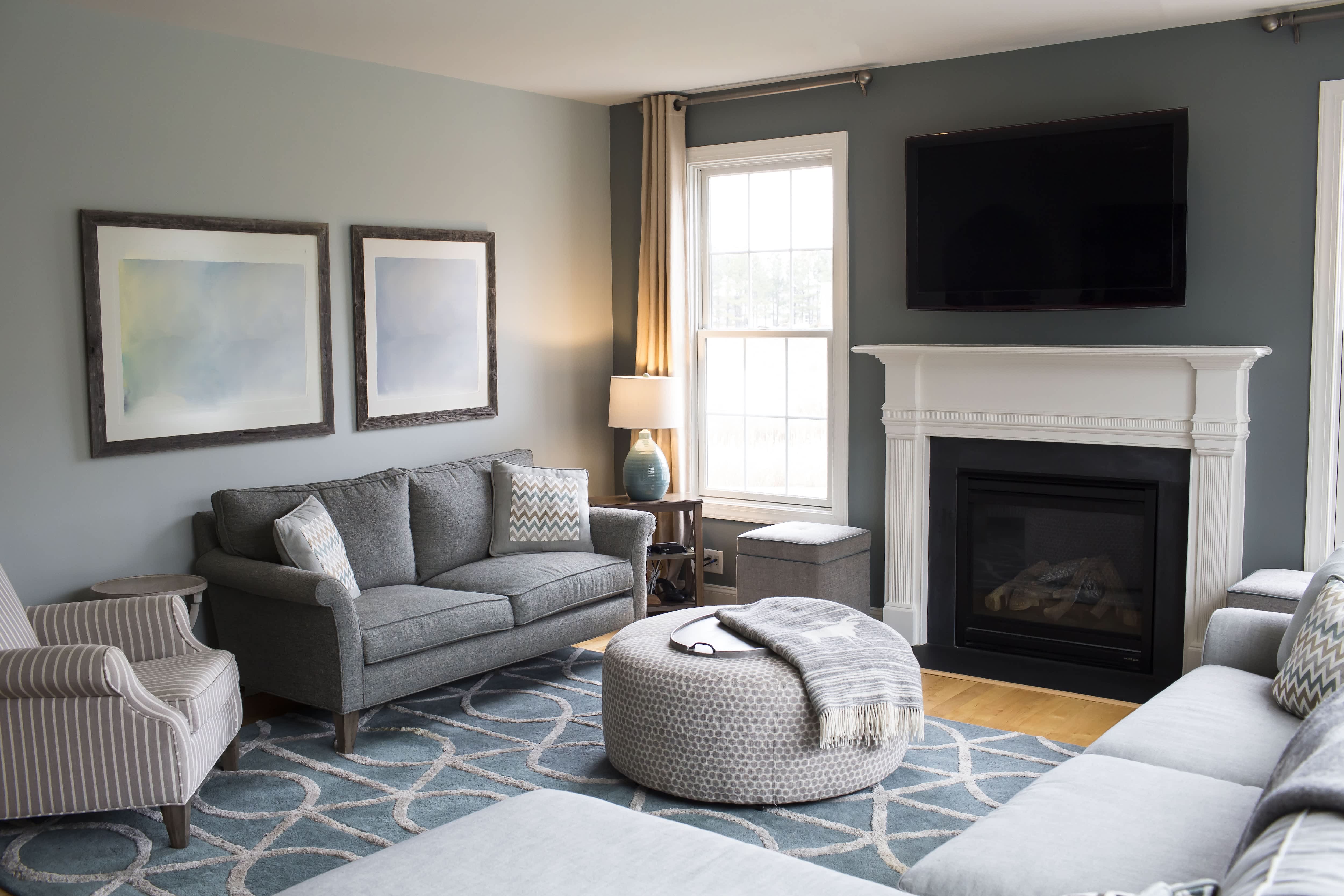 Small living room with blue accent wall