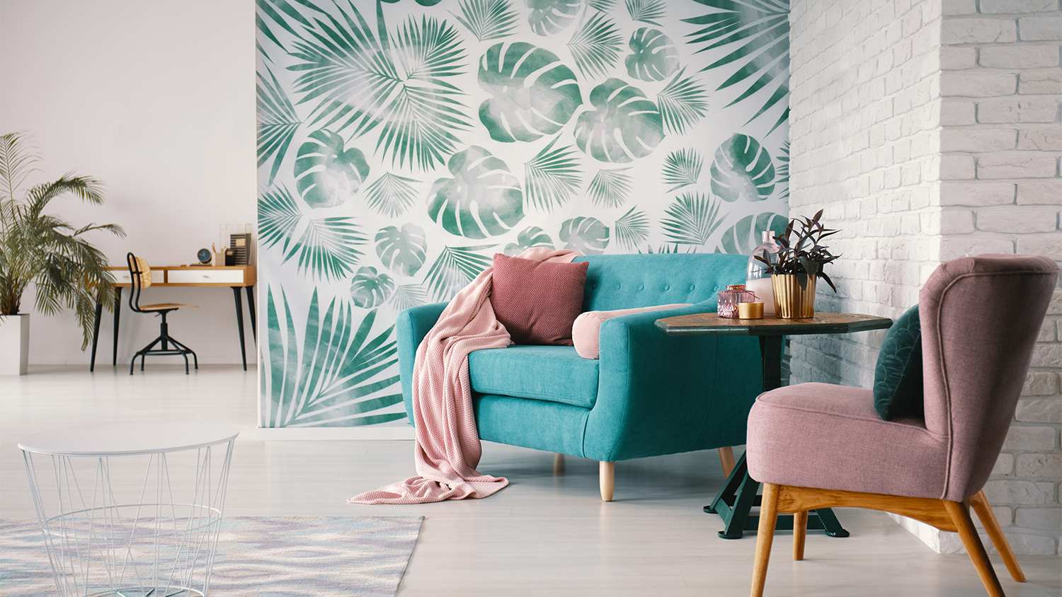 living room with turquoise leaf wallpaper