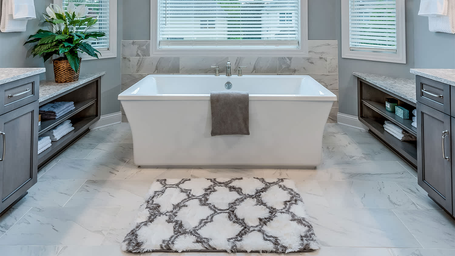 white and grey memory foam rug in luxurious bathroom