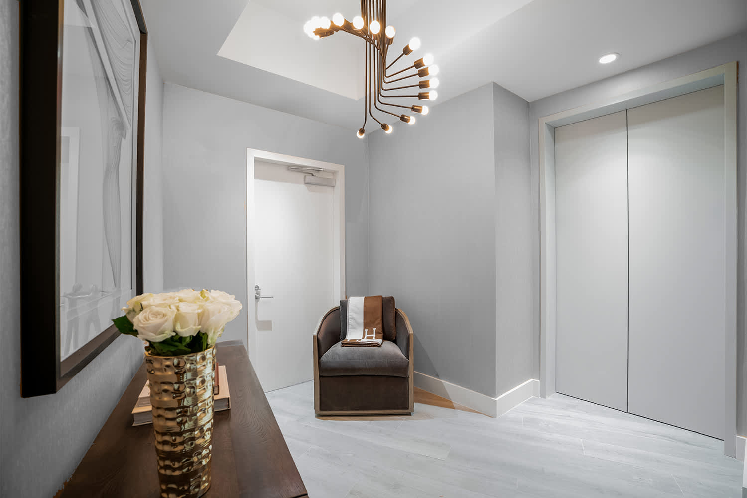 pewter condo entrance with elevator