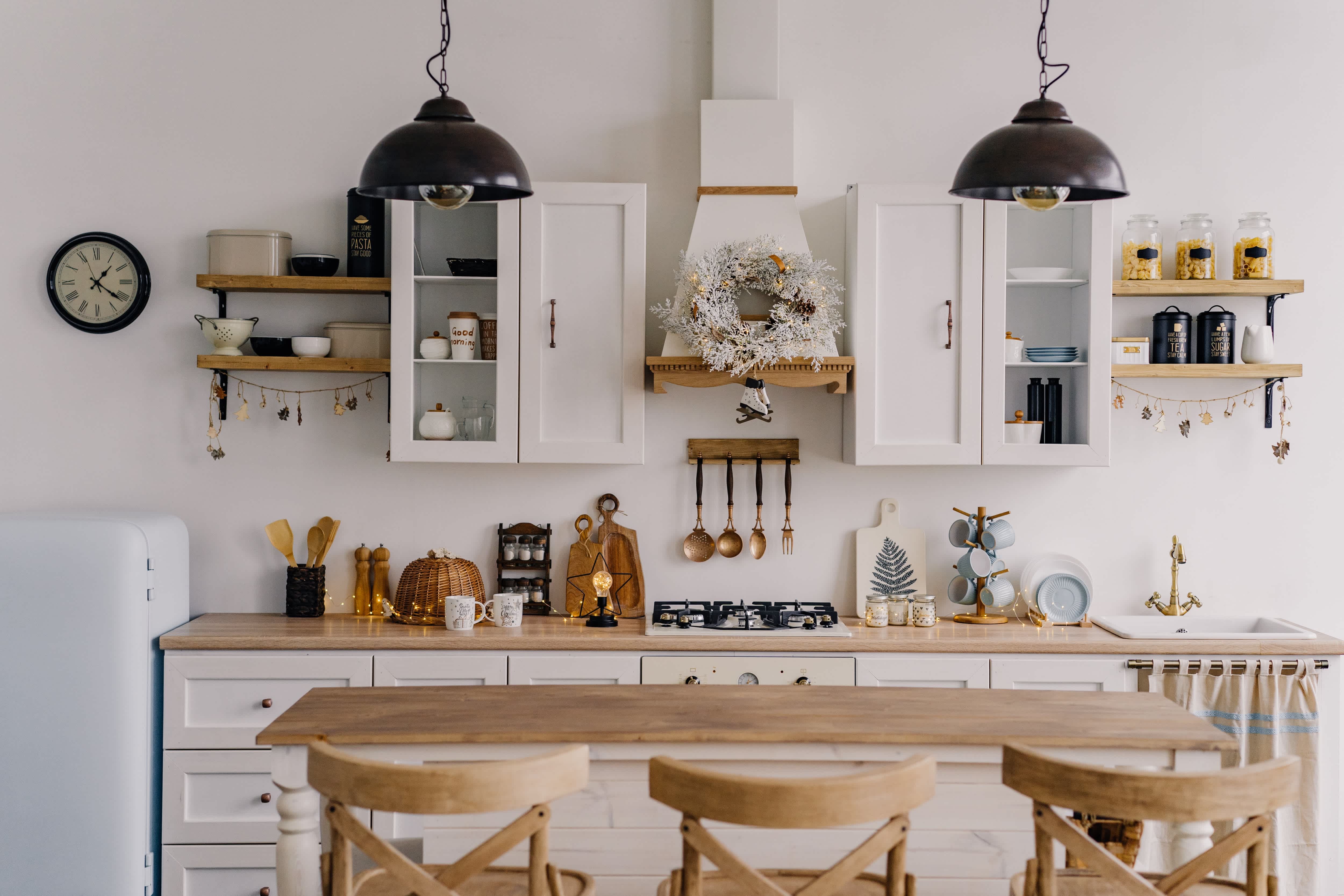 Open shelving in all-white kitchen