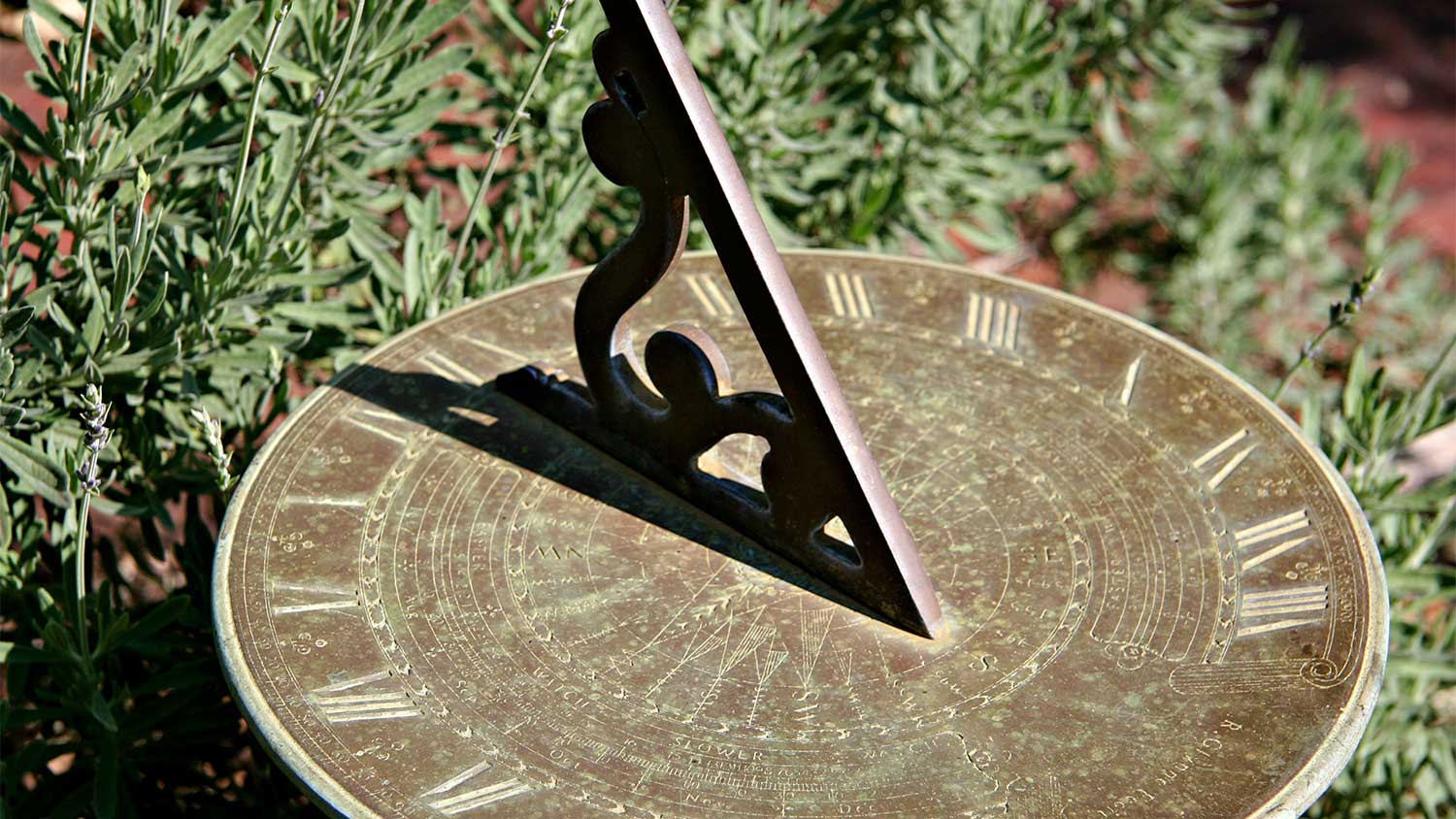 Sundial in garden closeup