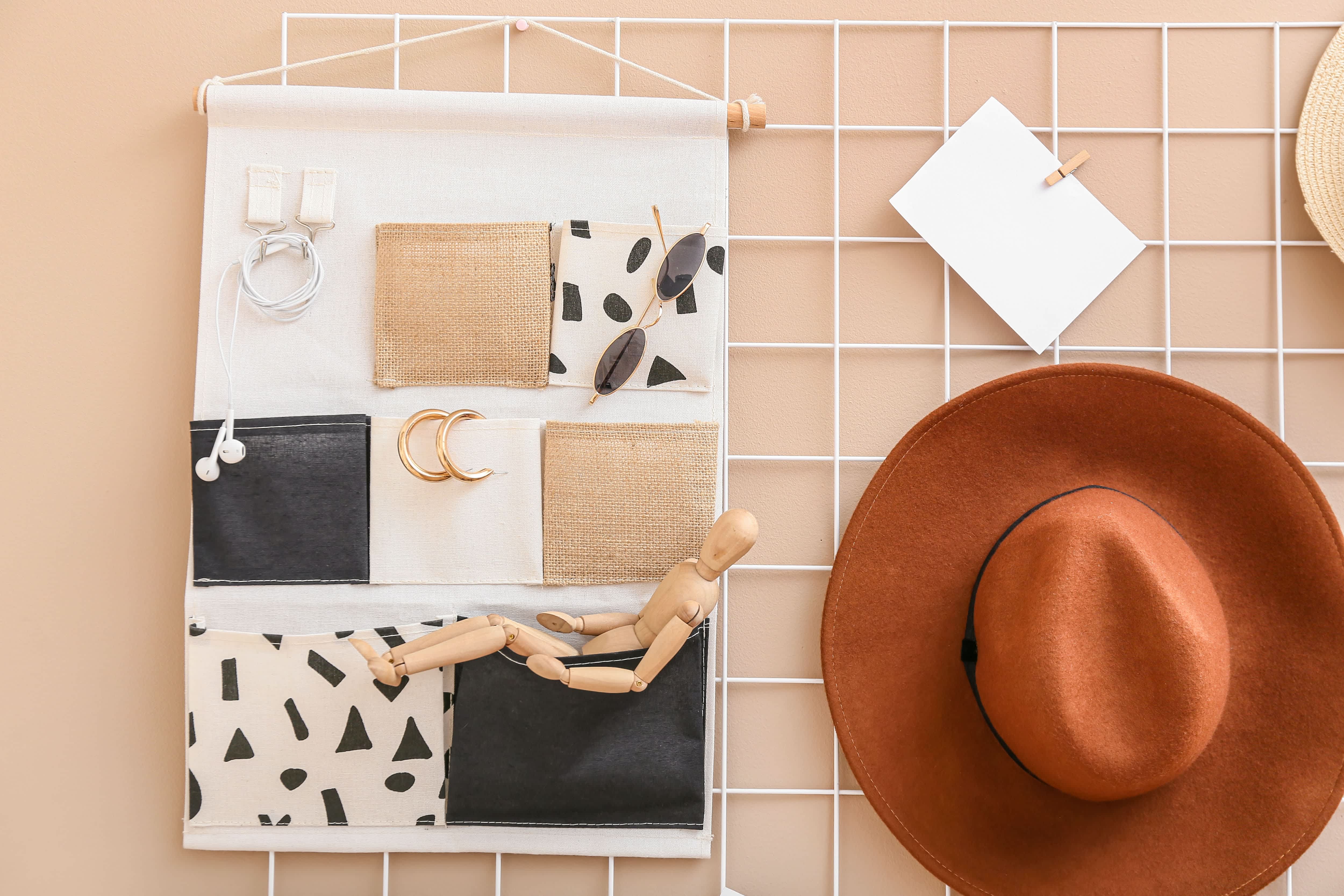 A DIY wall jewelry organizer with grid wire backing