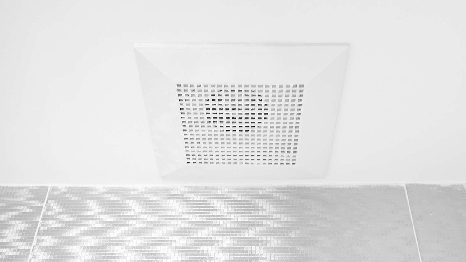 Exhaust fan closeup in bathroom