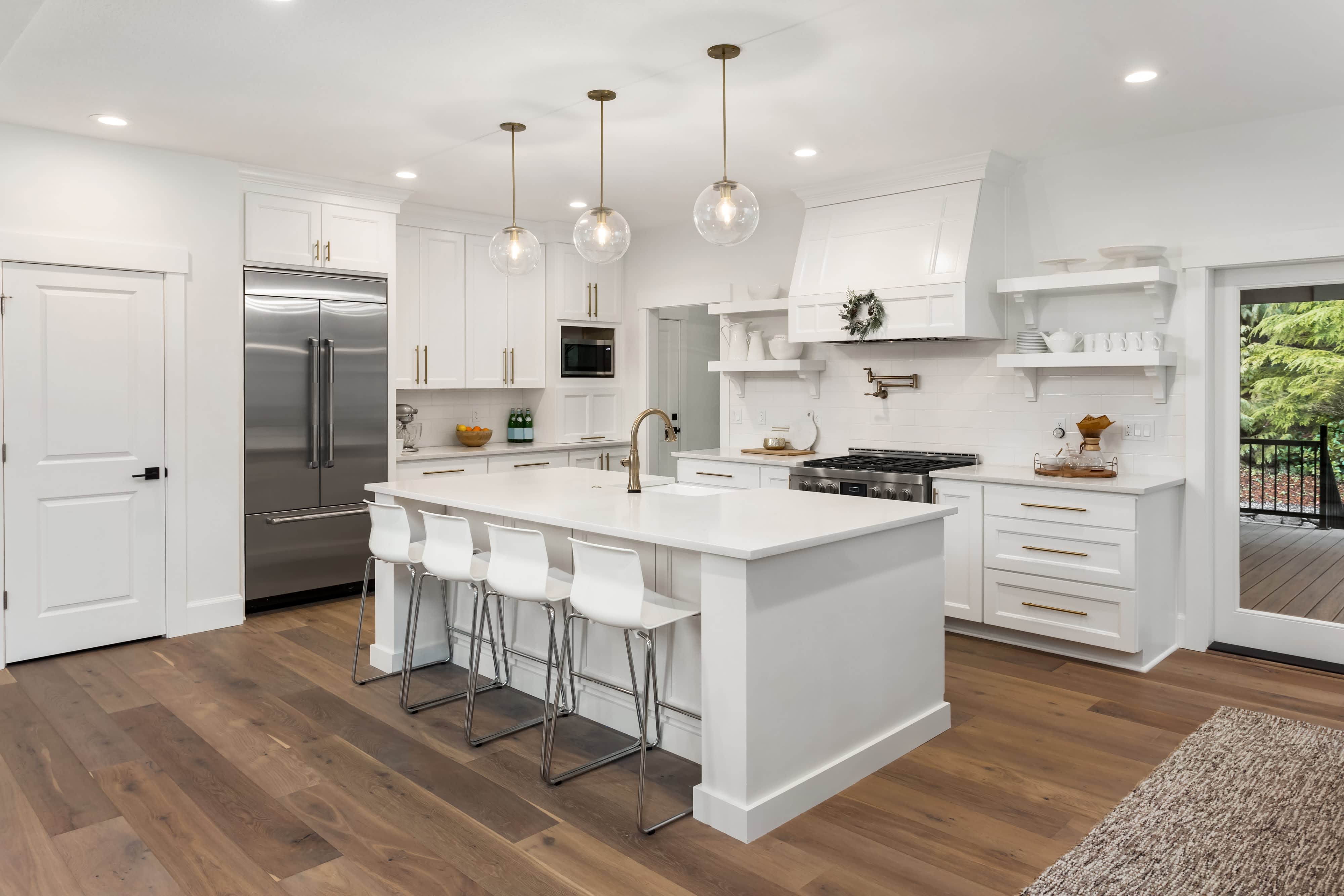 All-white kitchen with open shelves