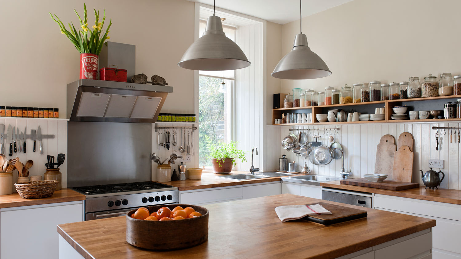 A spacious kitchen with open shelving