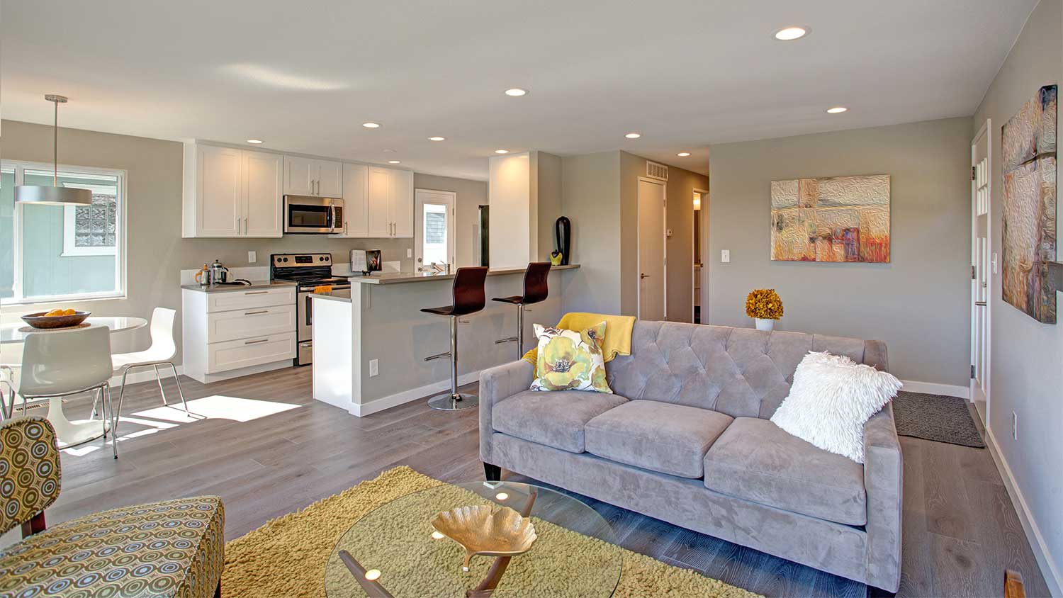 Open concept room with recessed lighting throughout