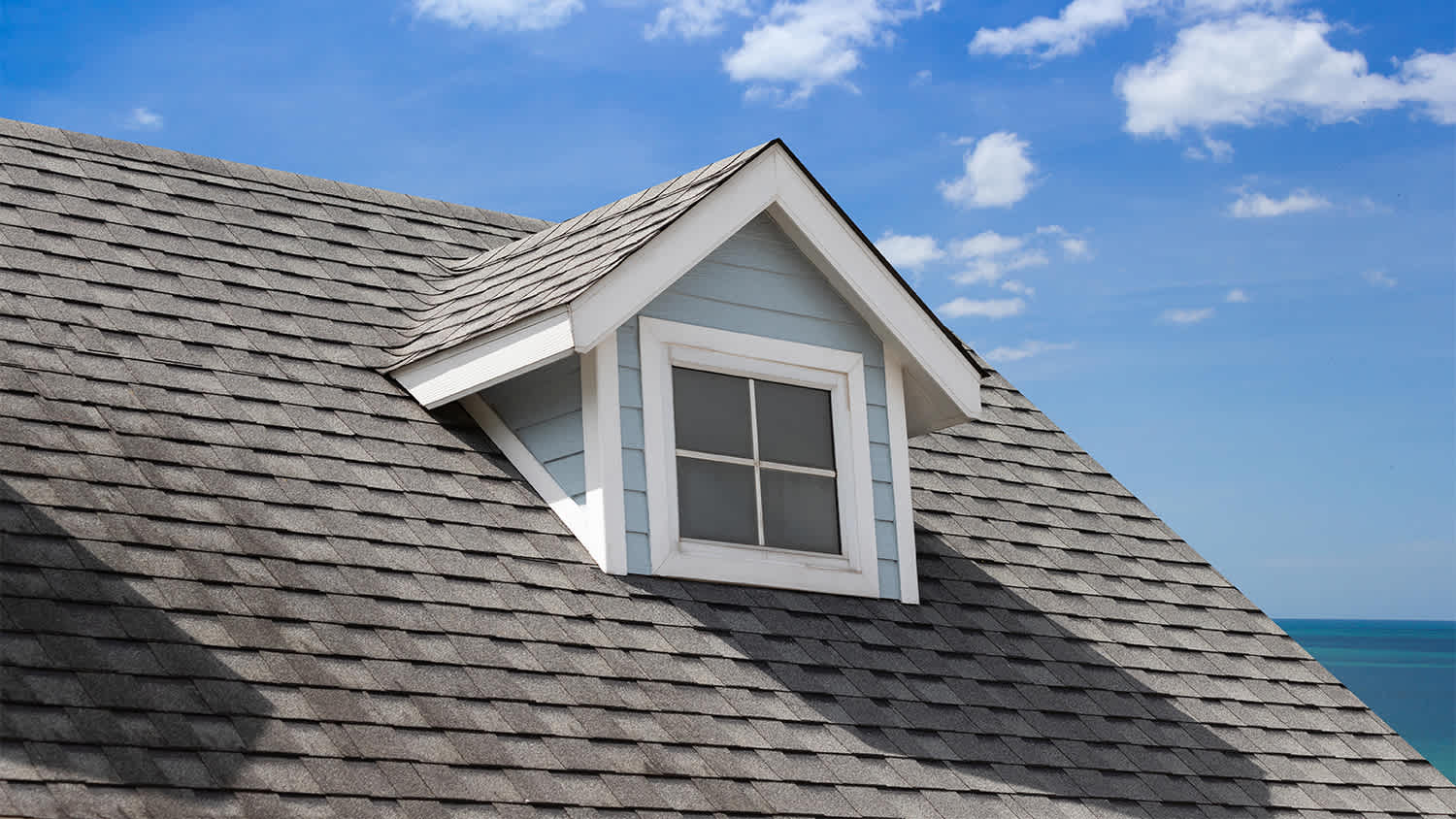 close up of roof with gray shingles