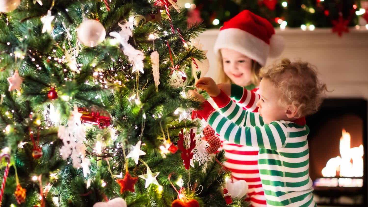 Kids decorating Christmas tree