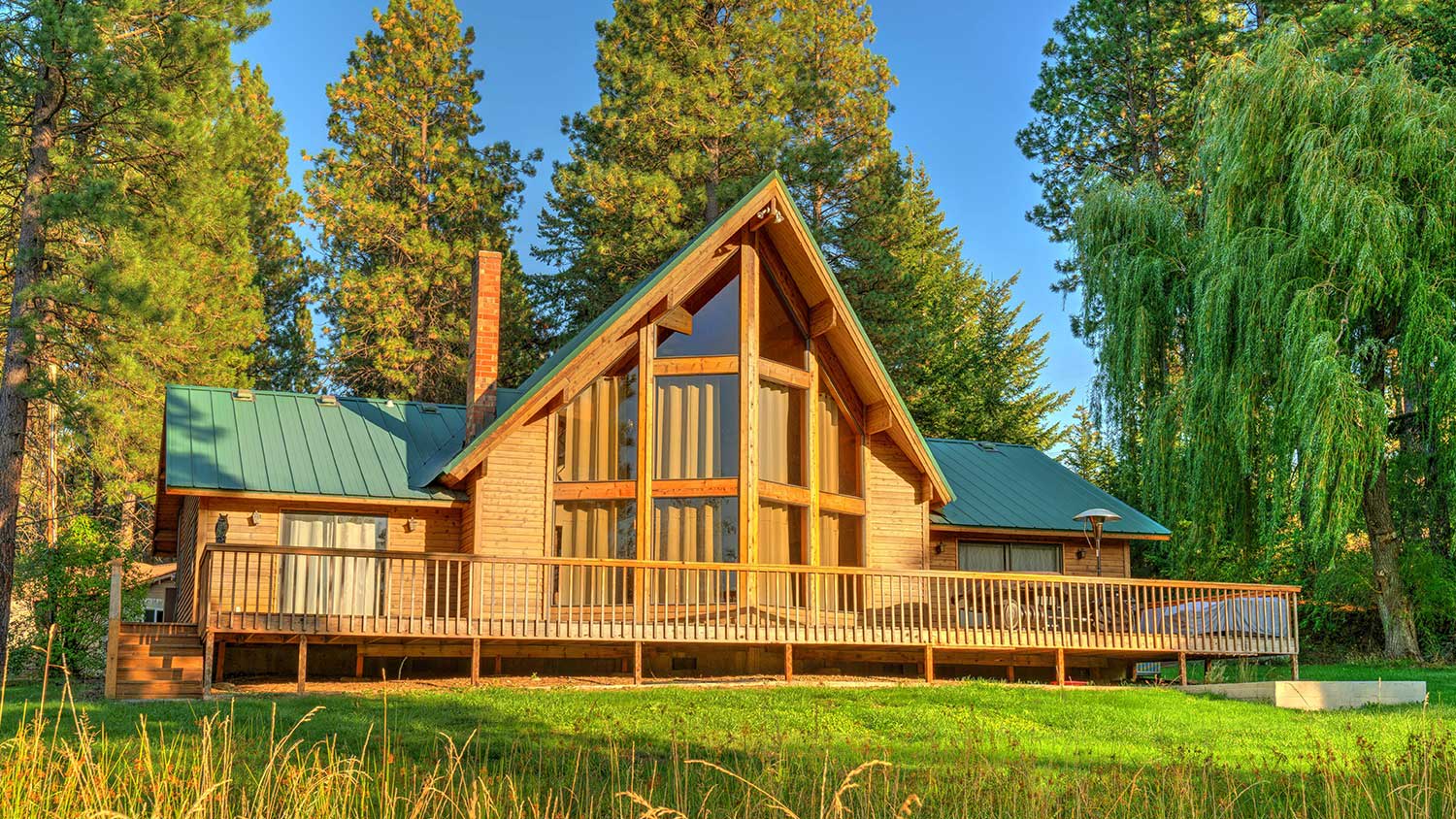 Luxury cedar cabin home with large deck