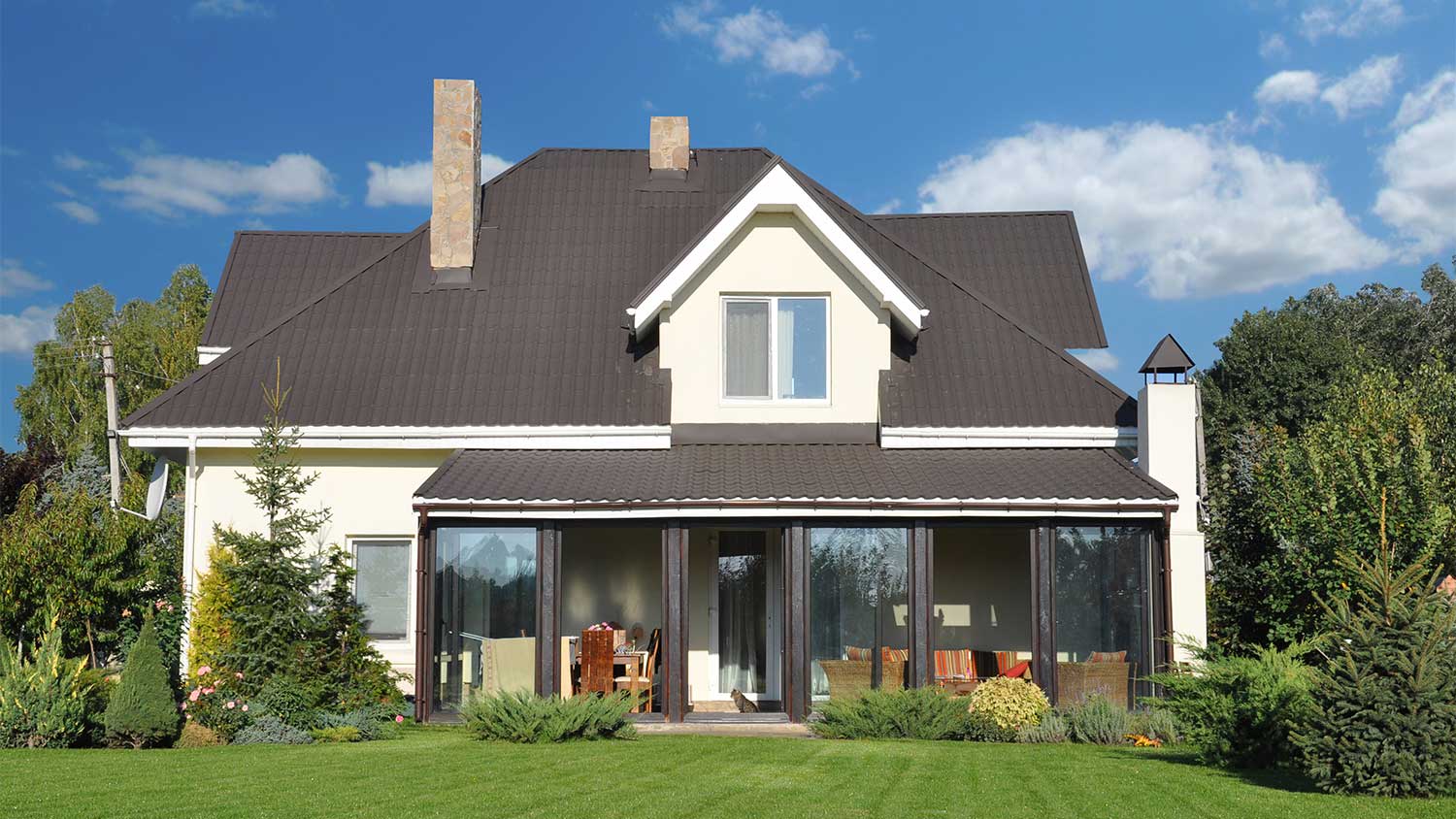 Home with gray roof in a rural area