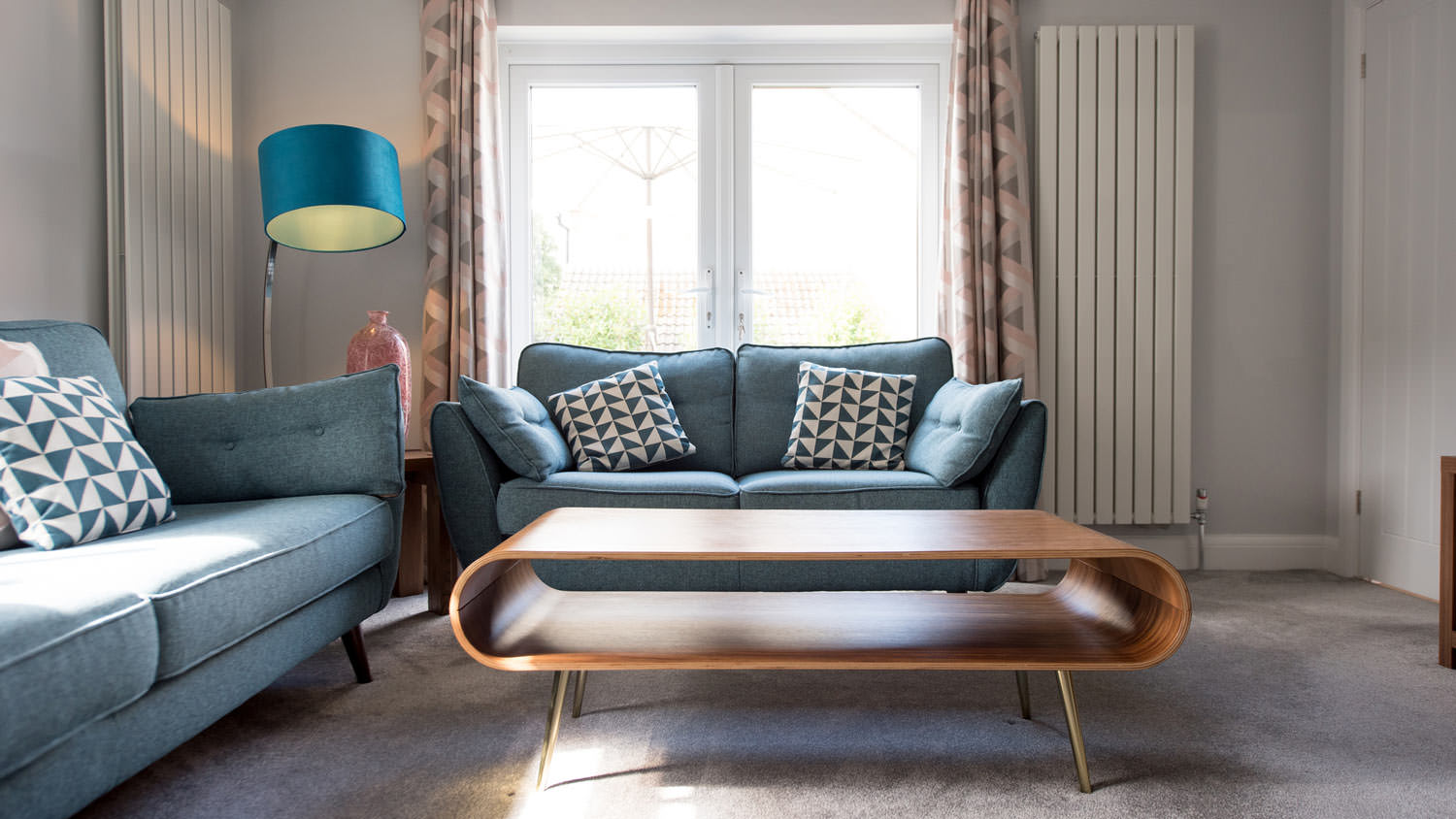 A retro living room with sofas and coffee table
