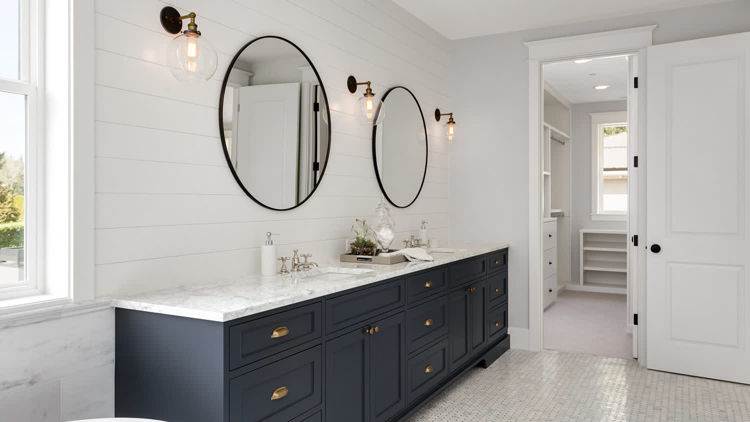 White shiplap walls in bathroom