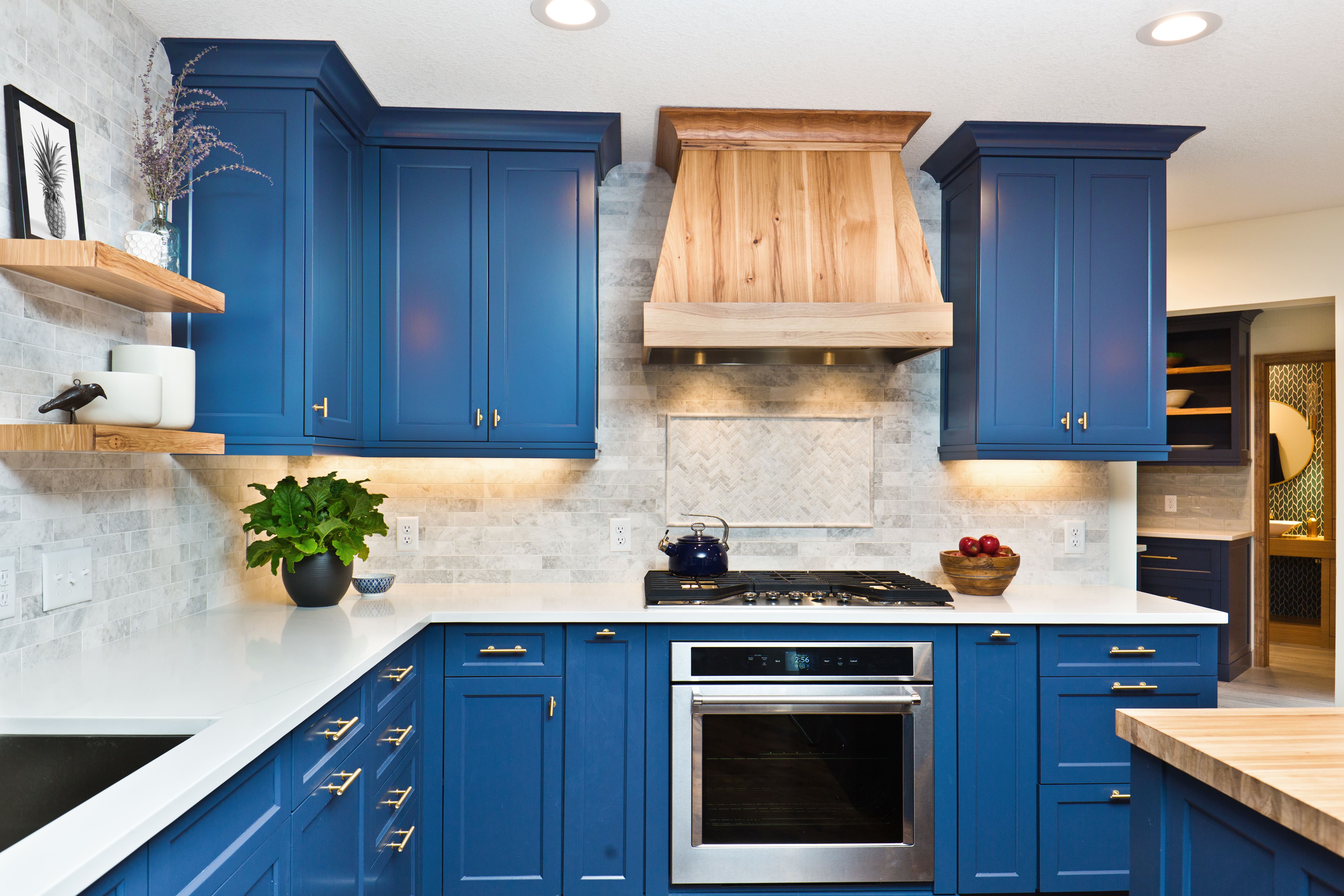 Kitchen cabinets painted a rich blue