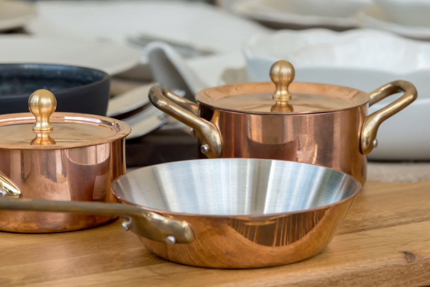 Copper pots and pan on the counter
