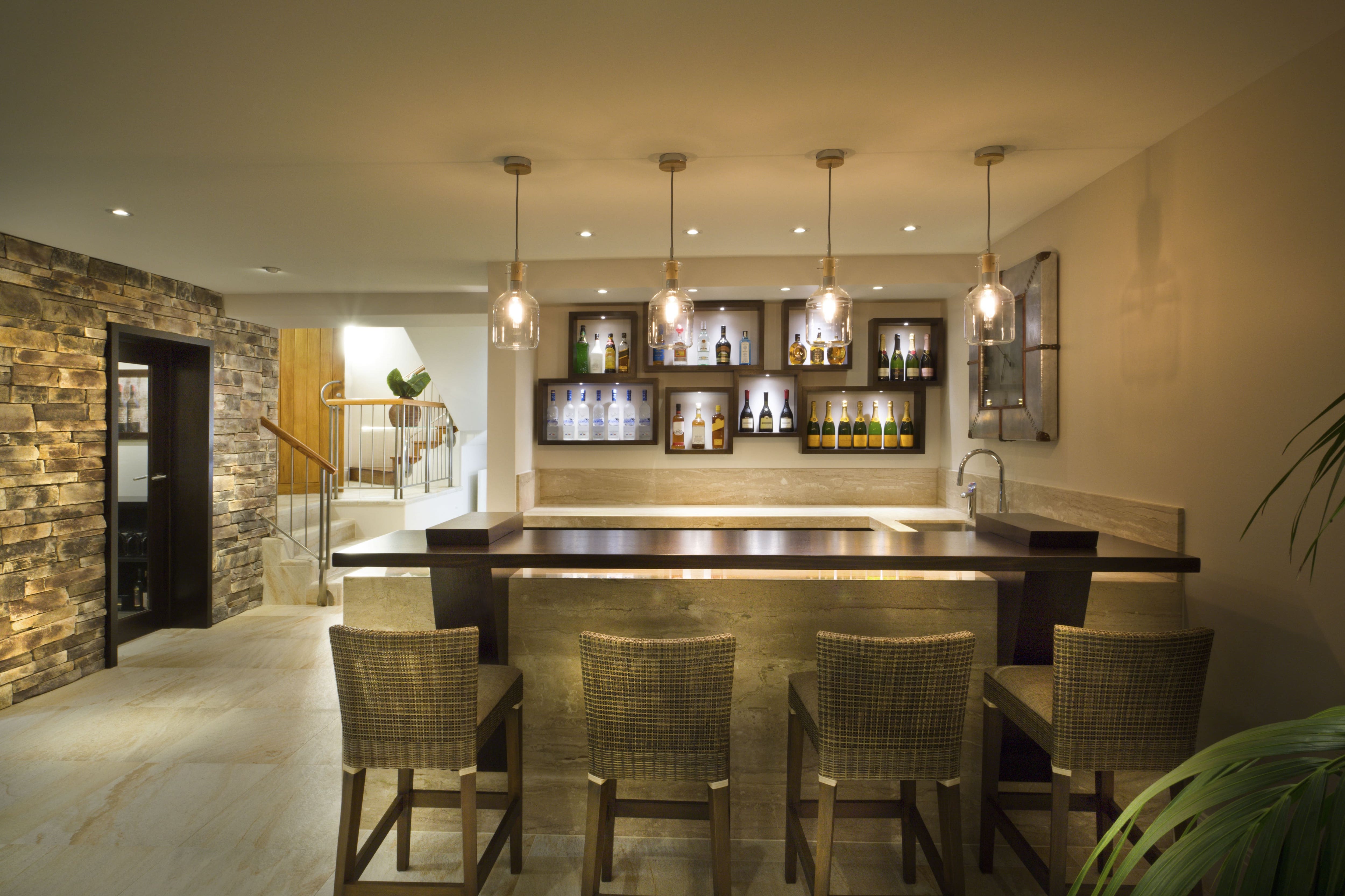 Basement bar with lit up shelves