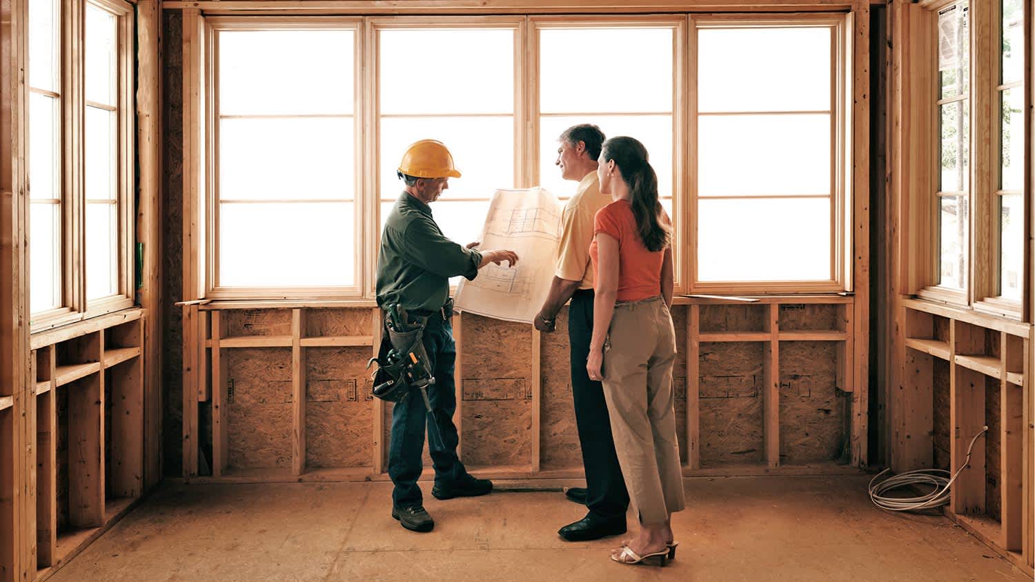 Couple consulting with an architect
