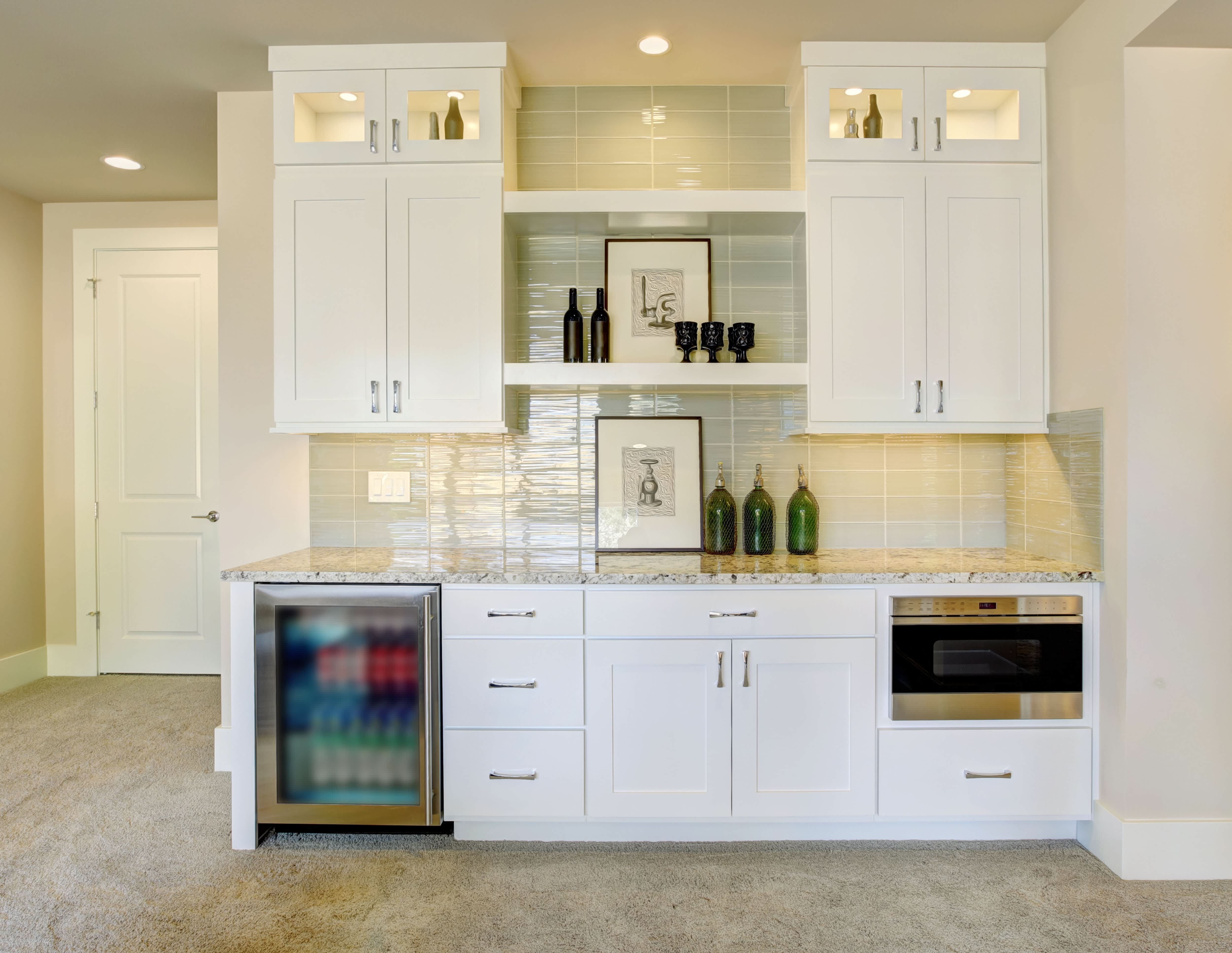 White built-in bar cabinetry