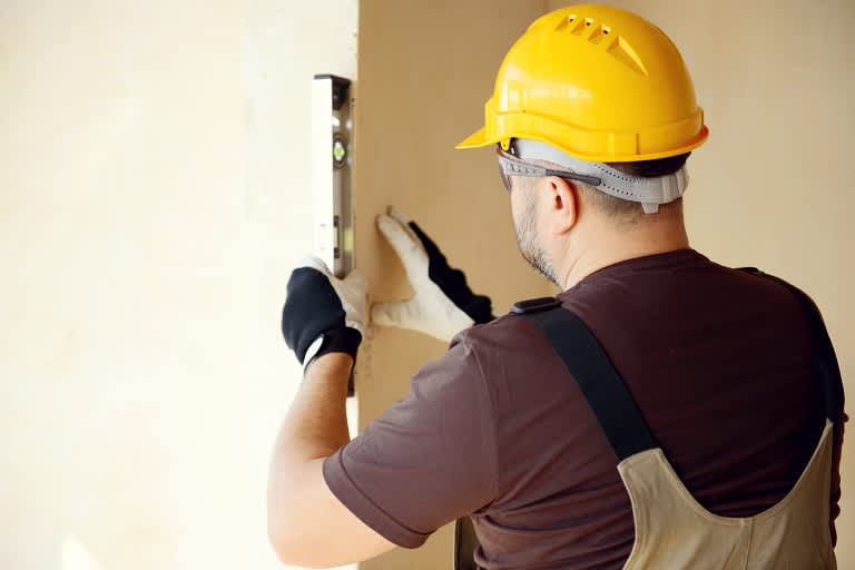 Contractor working on house