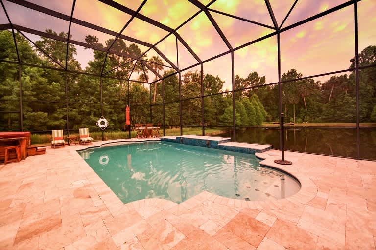 Pool with travertine tiles