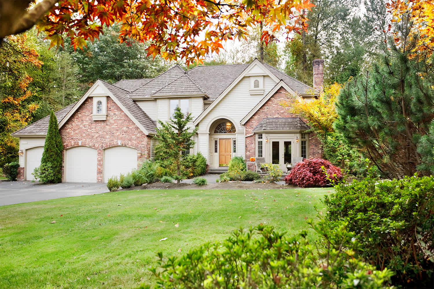 Large house with Fall leaves