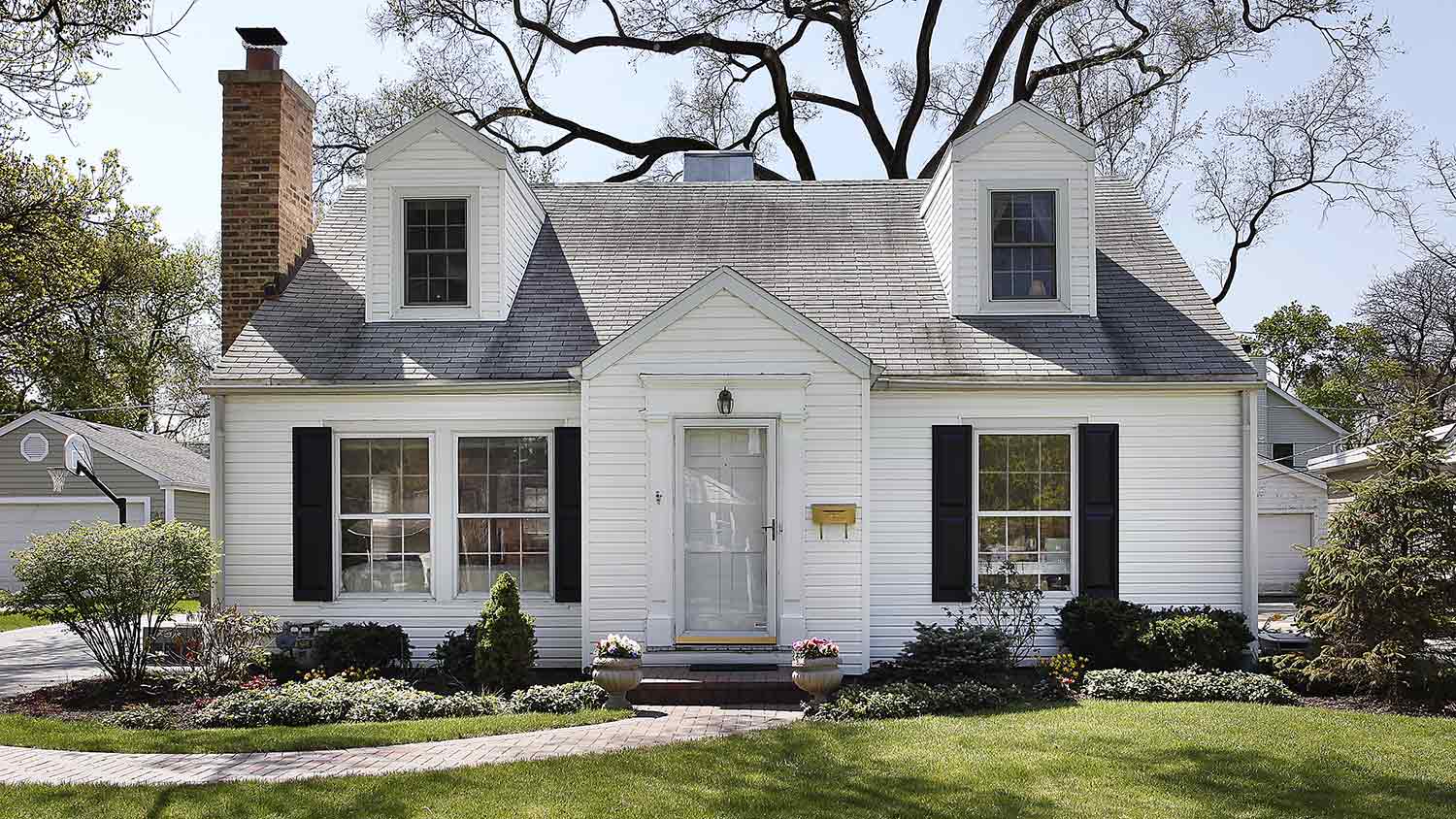 The exterior of a white suburban house