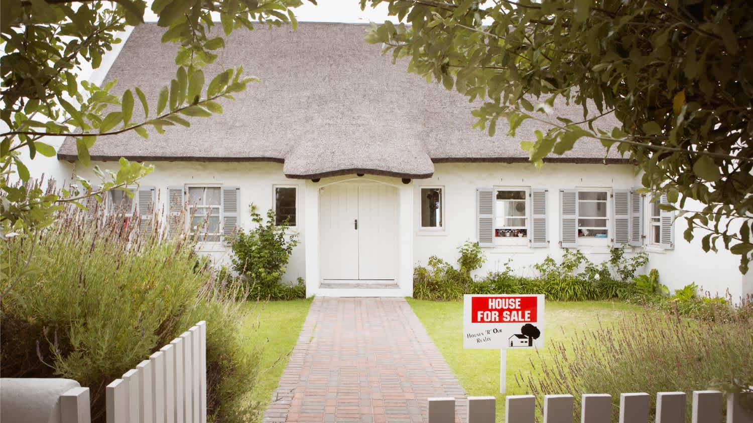 A house with for sale sign