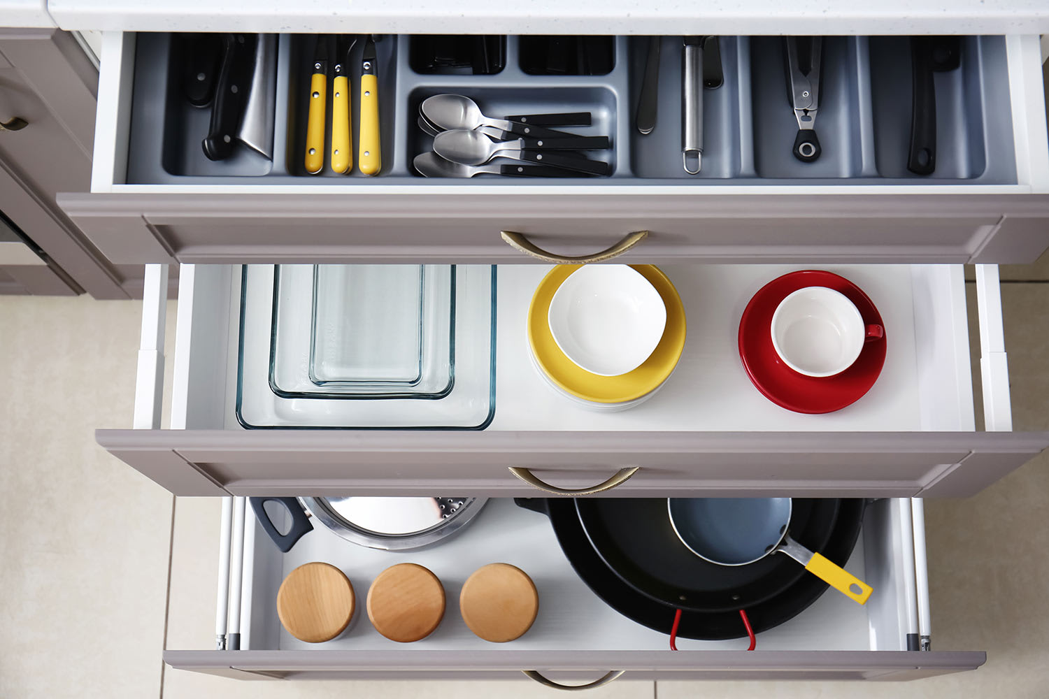 kitchenware stored in drawers