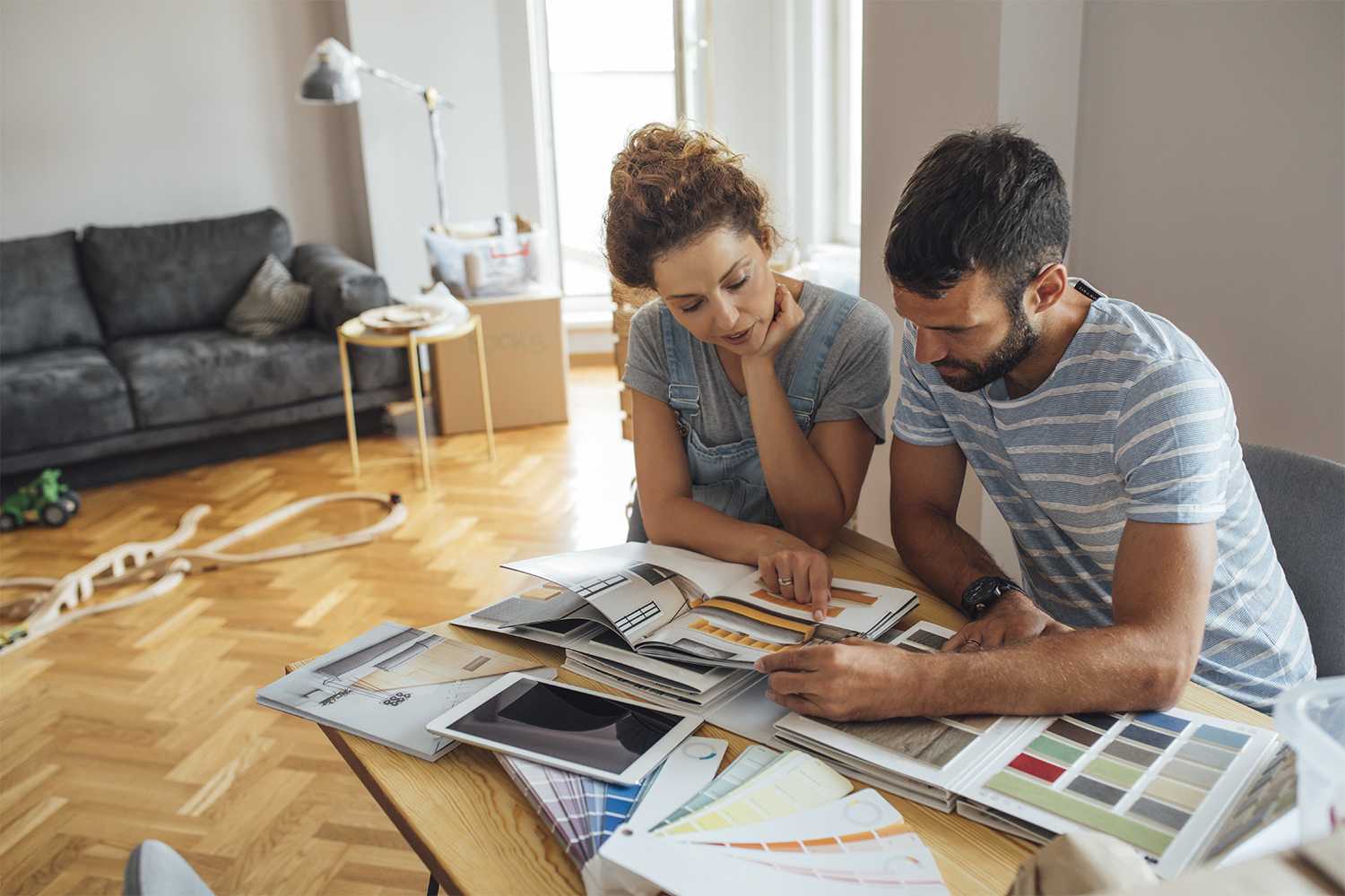 Couple planning style of home addition