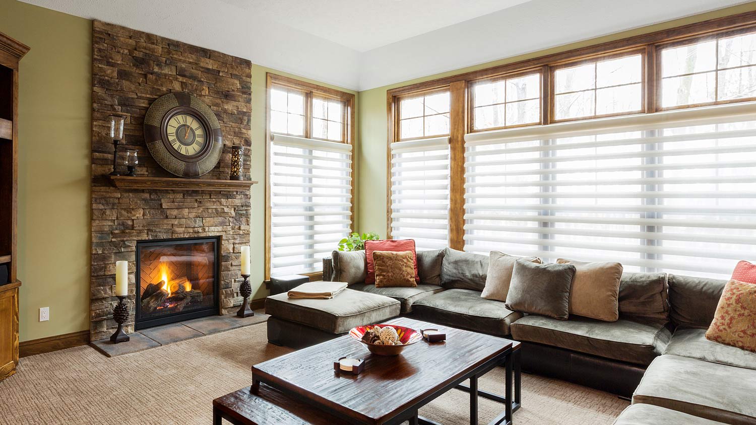 A living room with cellular shades
