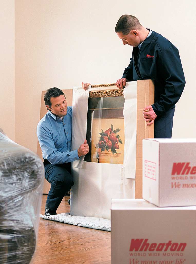 movers packing painting