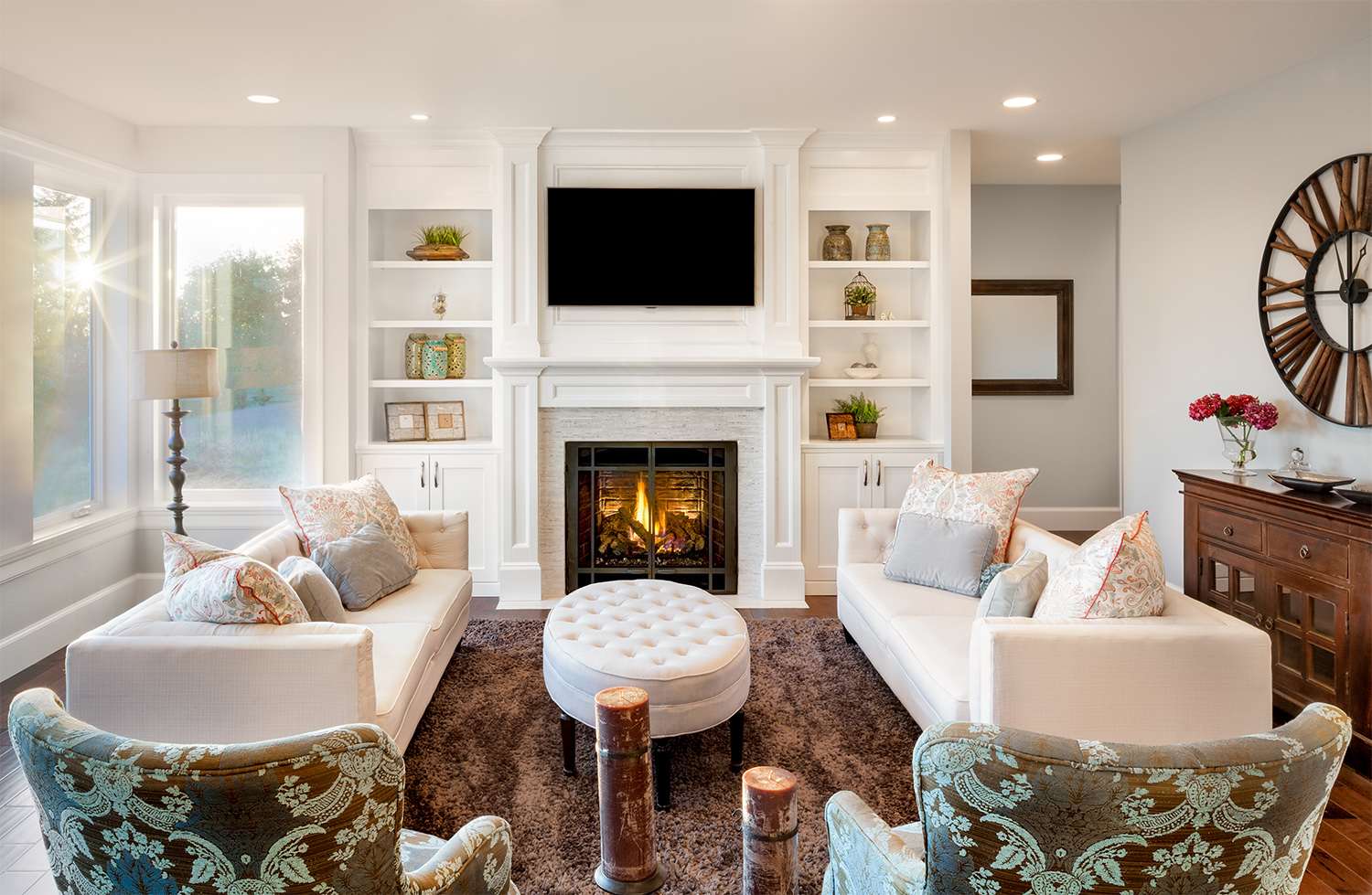 Luxury living room with fireplace going