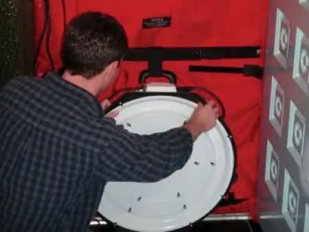A blower door test running on a house’s front door