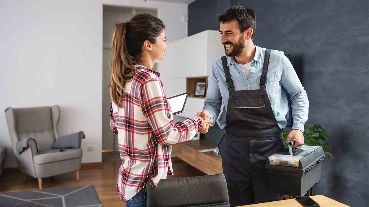 woman greeting handyman