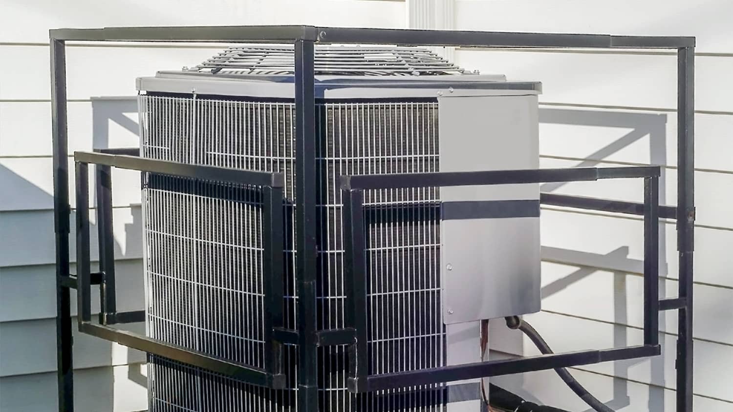 outdoor ac unit with metal cage