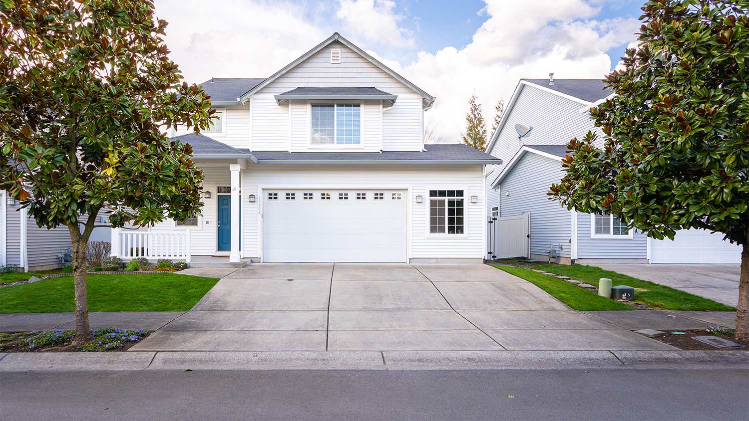 white and grey house in the neighborhood
