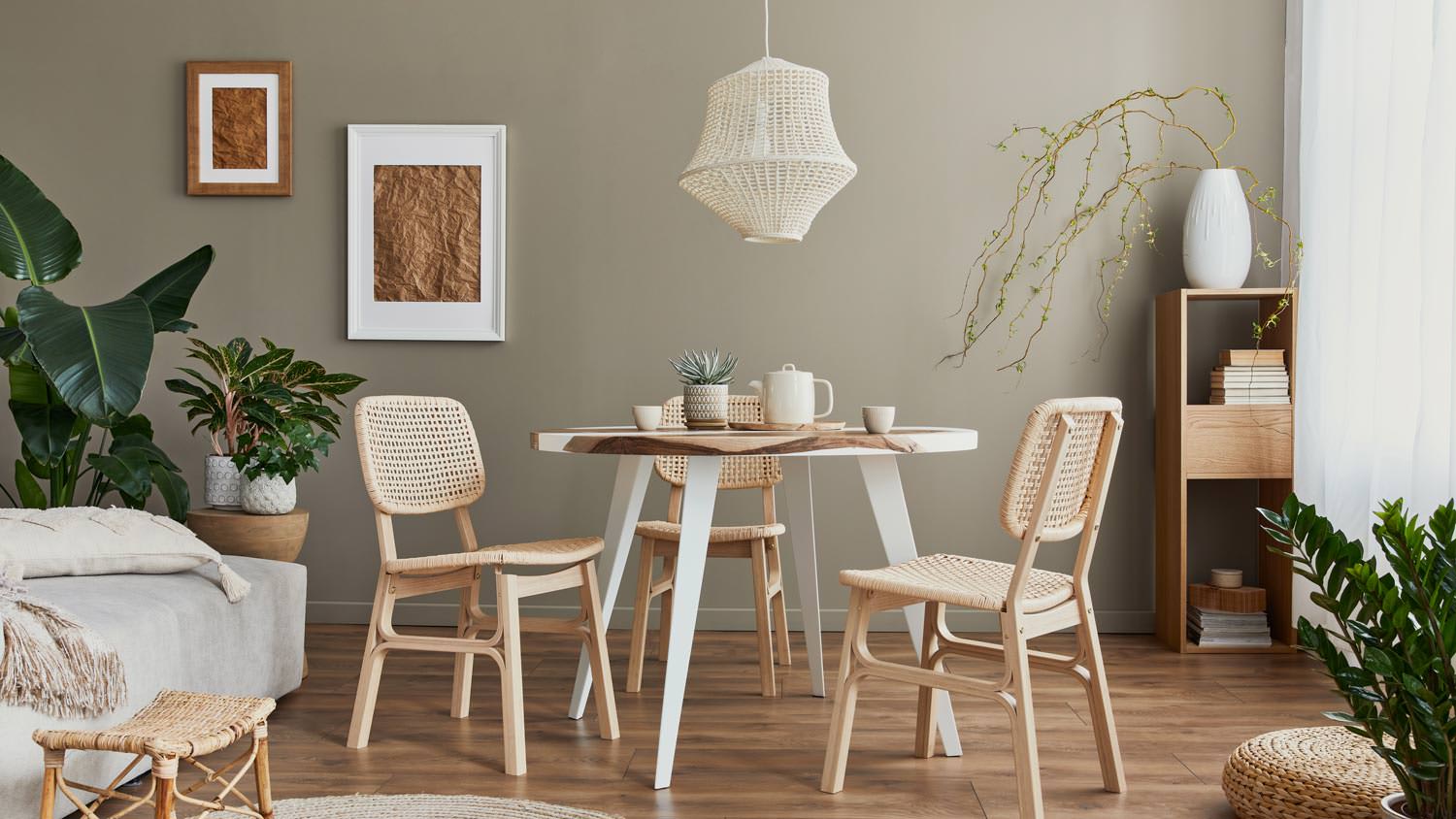 A wooden dining table with wooden chairs